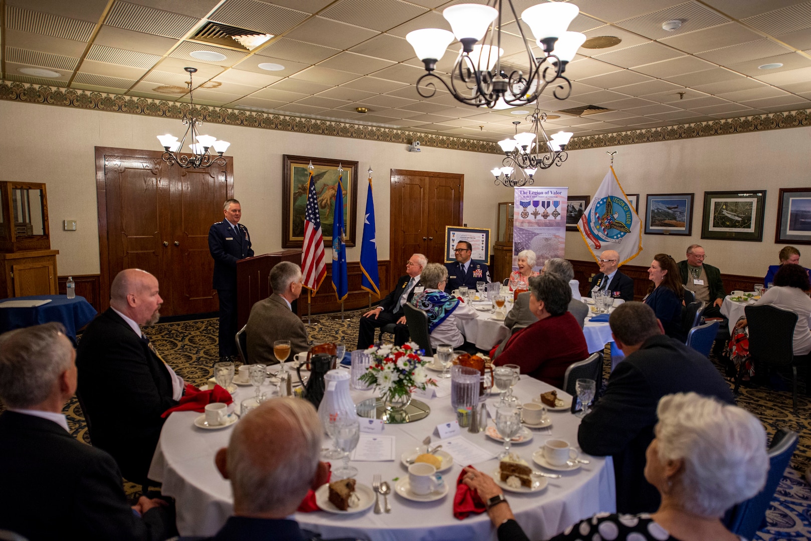 U.S. Air Force Lt. Gen. Brad Webb, commander of Air Education and Training Command, speaks with Medal of Honor and Service Cross recipients during the San Antonio Legion of Valor Chapter luncheon