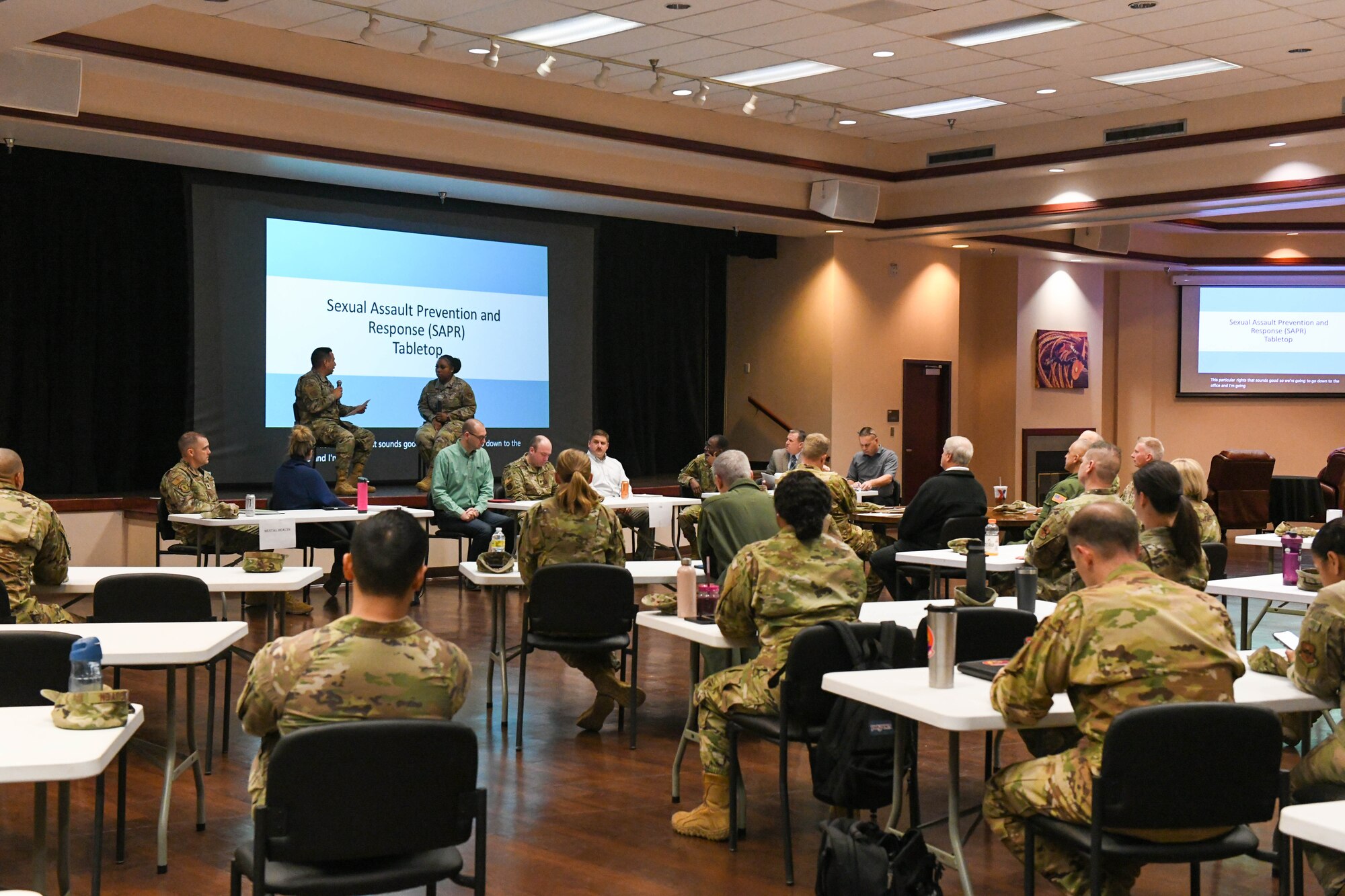 97th Air Mobility Wing leaders listen to a sexual assault scenario during Sexual Assault Prevention and Response training at Altus Air Force Base, Oklahoma, April 7, 2022. During the training, leaders learned about the different departments directly involved in a sexual assault case and the roles and responsibilities they have. (U.S. Air Force photo by Airman 1st Class Trenton Jancze)