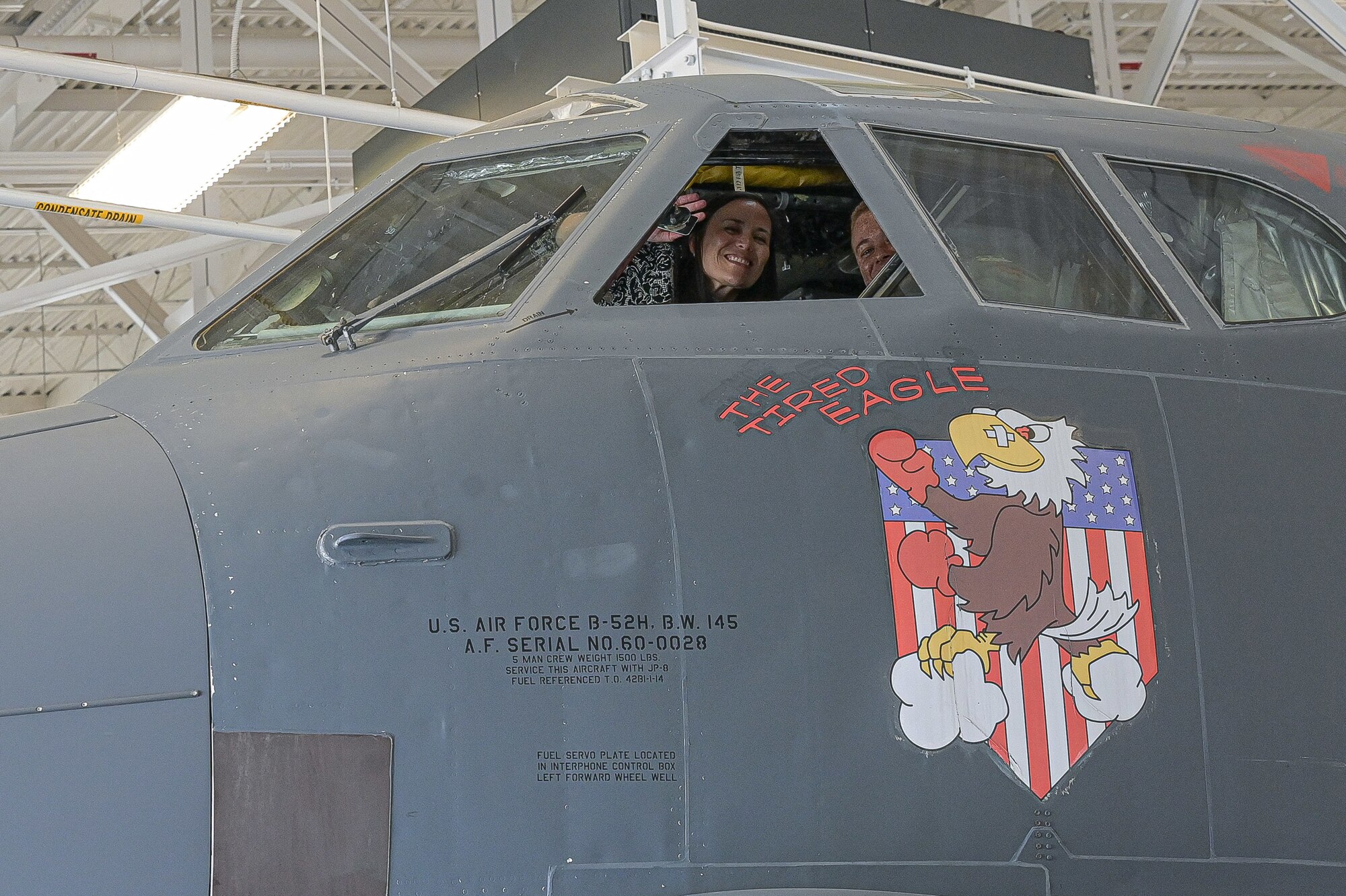 The Honorable Gina Ortiz Jones, Under Secretary of the Air Force, receives a B-52H Stratofortress tour by Capt. Kason Pifer, 96th Bomb Squadron B-52H Stratofortress pilot, about the B-52H Stratofortress NC3 capabilities during a visit to Barksdale Air Force Base, Louisiana, April 12, 2022. The NC3 is made of a multitude of ground, air and space components such as receivers and terminals.  (U.S. Air Force photo by Senior Airman Jonathan E. Ramos)