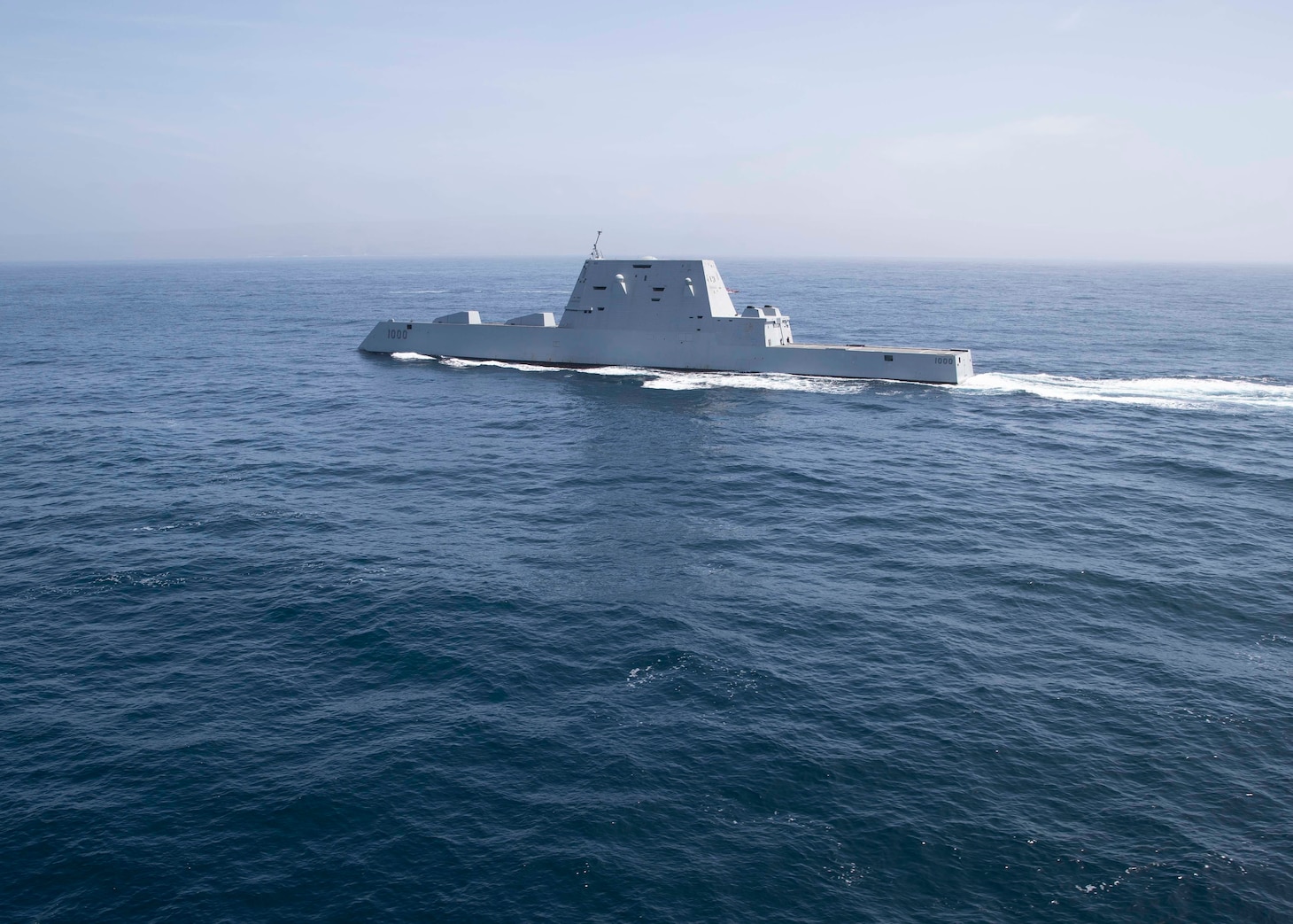 The Zumwalt-class guided-missile destroyer USS Zumwalt (DDG 1000) sails through the Pacific Ocean, April 10, 2022.