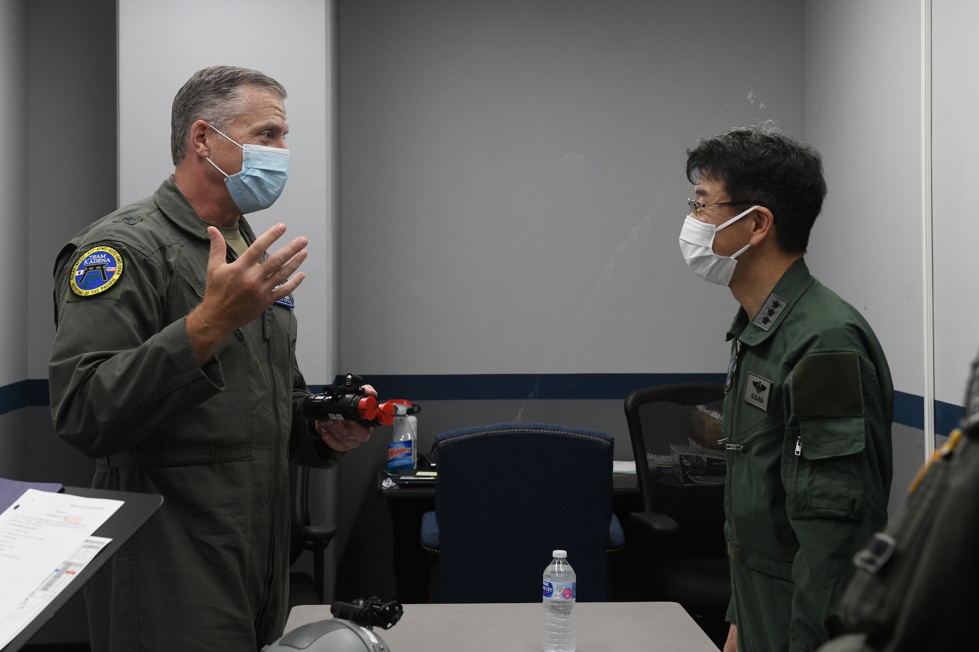 U.S. Air Force Brig. Gen. David Eaglin, 18th Wing commander, meets with Japan Air Self-Defense Force Lt. Gen. Masahito Yajima, Southwestern Air Defense Force commander, prior to a familiarization flight at Kadena Air Base, Japan, April 12, 2022. Yajima’s visit to Kadena highlighted the 18th Wing's commitment to strengthening the alliance between U.S. and Japanese forces by fortifying their combined combat capabilities in support of a free and open Indo-Pacific region. (U.S. Air Force photo by Staff Sgt. Benjamin Raughton)