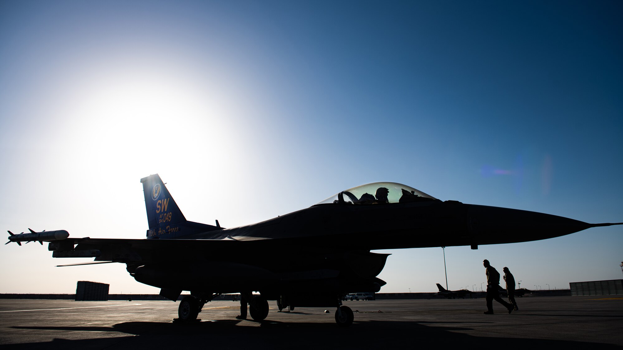 An F-16 taxis at an Air Base.