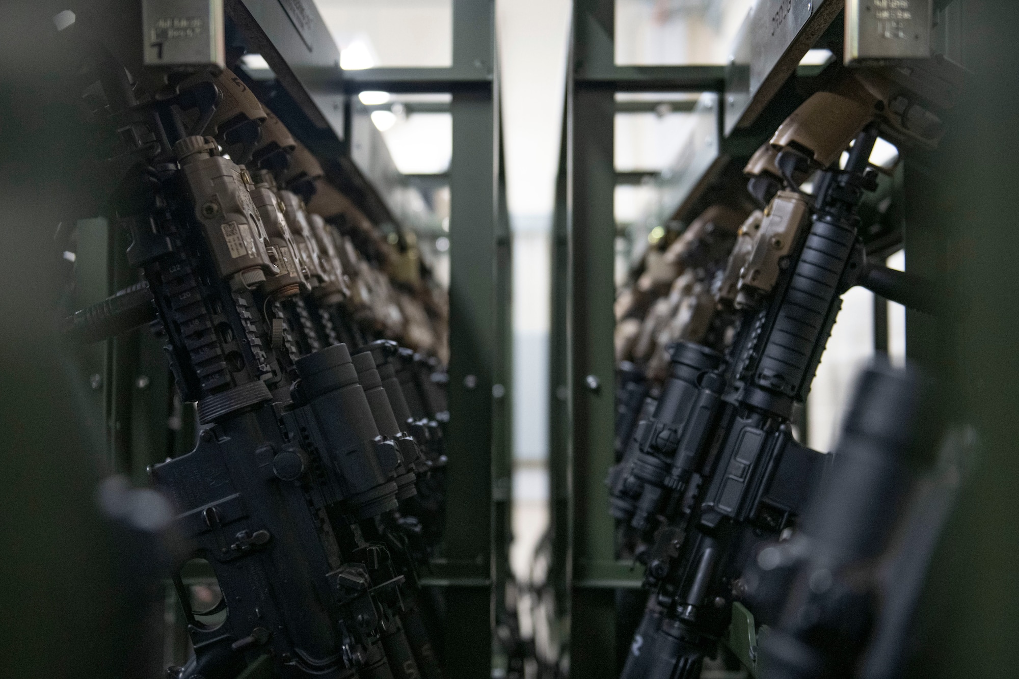 Weapons sit in their racks at RAF Croughton, England, April 6, 2022. The armory was the first in the entire Air Force to fully integrate a radio-frequency identification tracking system. (U.S. Air Force photo by Senior Airman Jason W. Cochran)