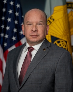Barry W. Hoffman, U.S. Army Financial Management Command deputy to the commanding general, poses for an official photo at the Maj. Gen. Emmett J. Bean Federal Center April 12, 2022. USAFMCOM conducts enterprise-level financial operations, provides technical coordination for Finance and Comptroller units and military pay support with commands across the Army, in order to ensure the effective implementation of policies and programs to support optimally resourcing the Army and supporting Soldiers. (U.S. Army photo by Mark R. W. Orders-Woempner)