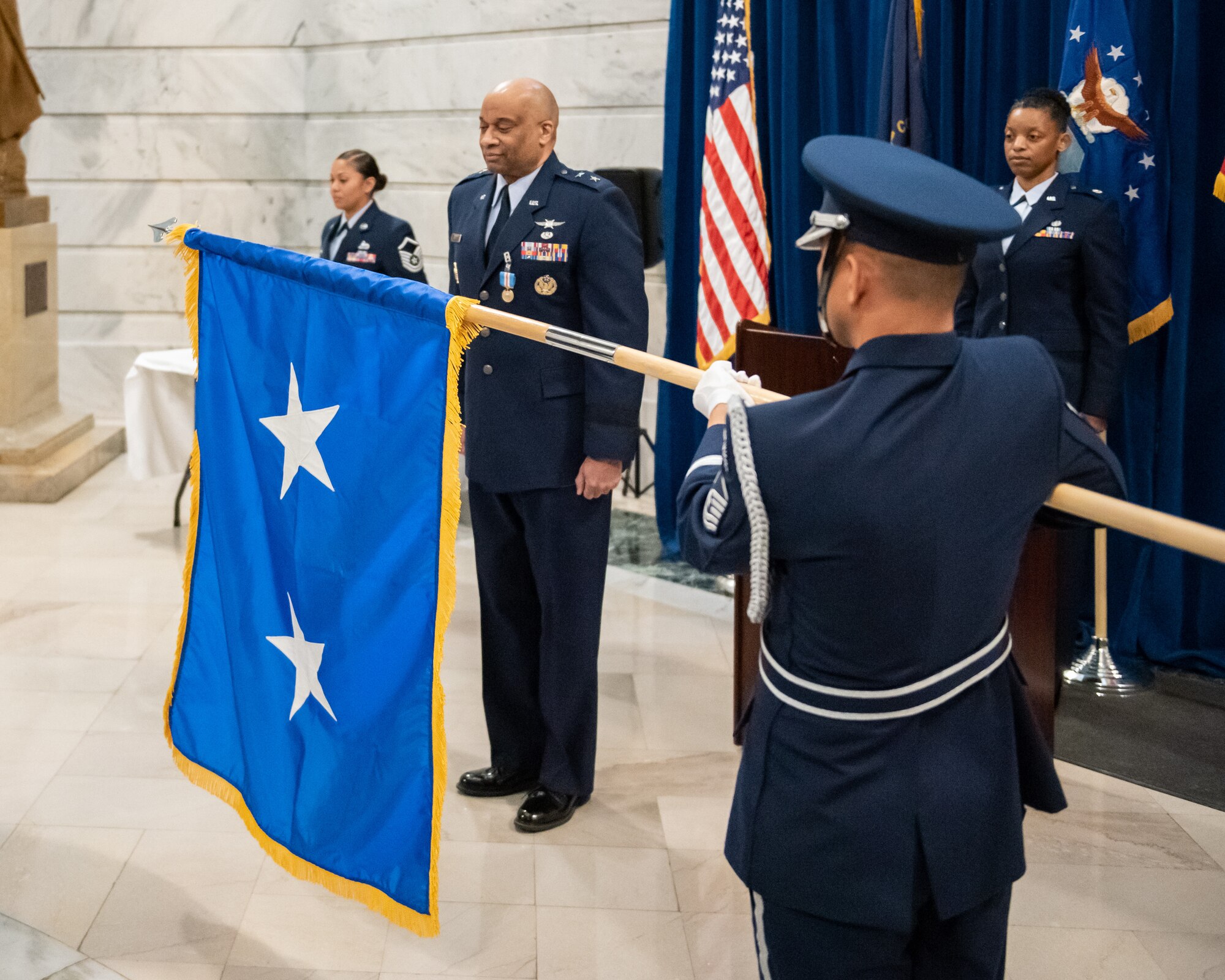 Charles M. Walker is promoted to the rank of major general during ceremony held in the Capitol Rotunda in Frankfort, Ky., March 12, 2022. Walker, who previously served as chief of staff for the Kentucky Air National Guard, is the director of the Office of Complex Investigations at the National Guard Bureau, Joint Base Andrews, Md. (U.S. Air National Guard photo by Dale Greer)