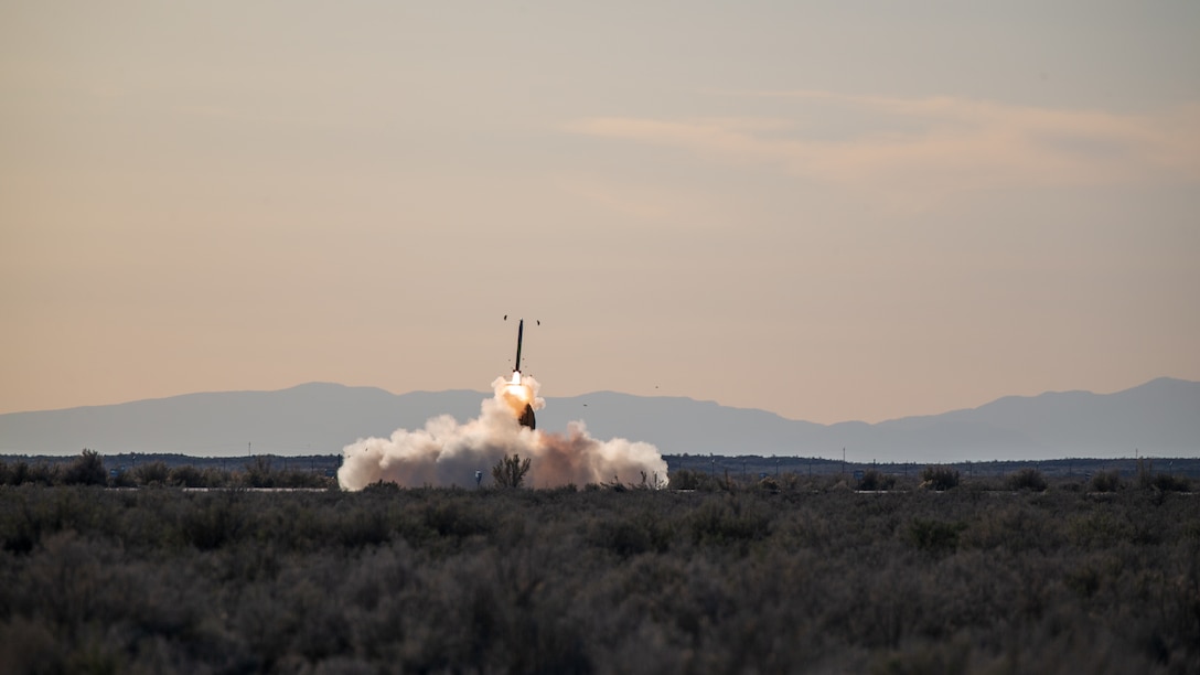 A U.S. Marine Corps M142 High Mobility Artillery Rocket System assigned to Kilo Battery, 2nd Battalion, 14th Marine Regiment, Marine Forces Reserve, fires a rocket while conducting a HIMARS rapid insertion training event during Weapons and Tactics Instructor course 2-22, Dugway Proving Ground, Utah, April 6, 2022. HIMARS Marines and Marine aircrew routinely train to conduct HIMARS rapid insertion missions, facilitating the expedient and efficient execution of the mission.