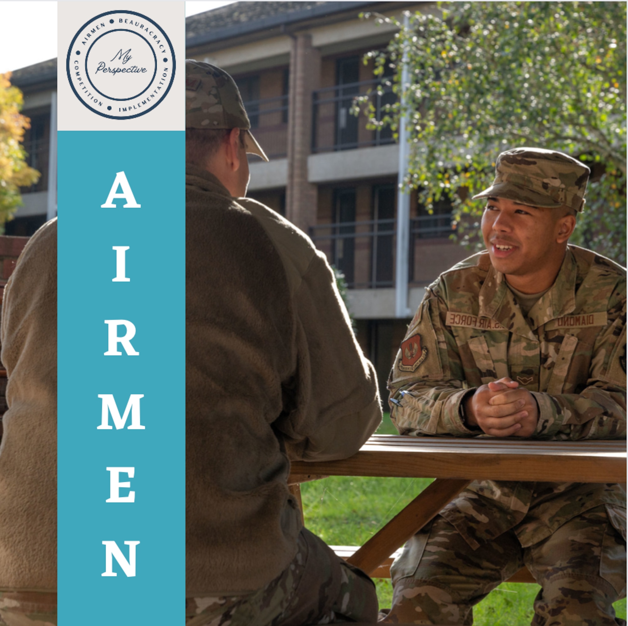 Airmen have a discussion during a First Term Airmen Course mentorship session.