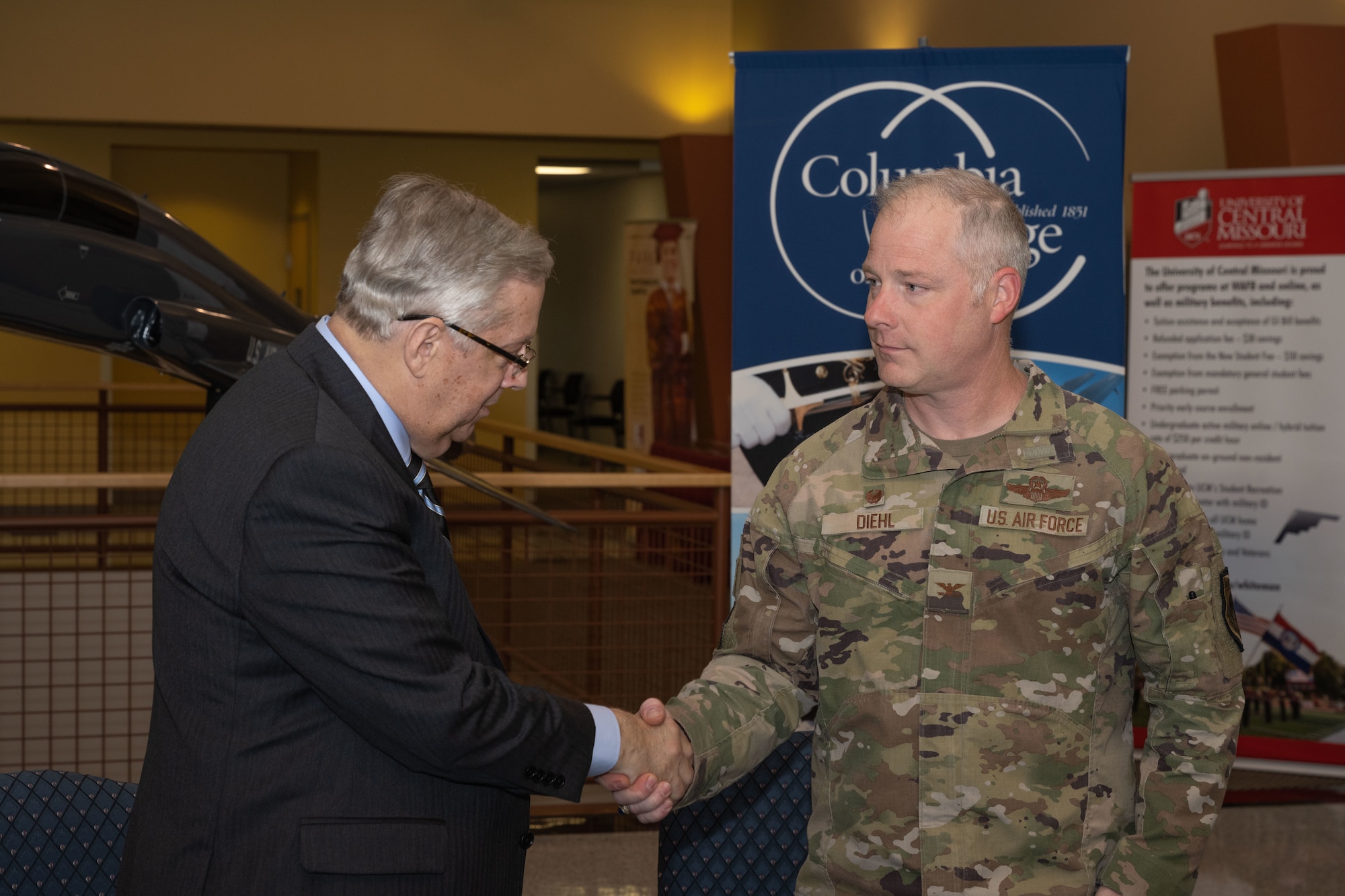 U.S. Air Force Col. Daniel Diehl, Commander of the 509 Bomb Wing, signs a memorandum of understanding between Columbia College and the 509th Bomb Wing on Whiteman Air Force Base on April 14,2022. The memorandum acknowledges Columbia College's partnership by opening it's programs to the Air Force Voluntary Education Program (U.S. Air Force Photo by Airman 1st Class Bryson Britt)
