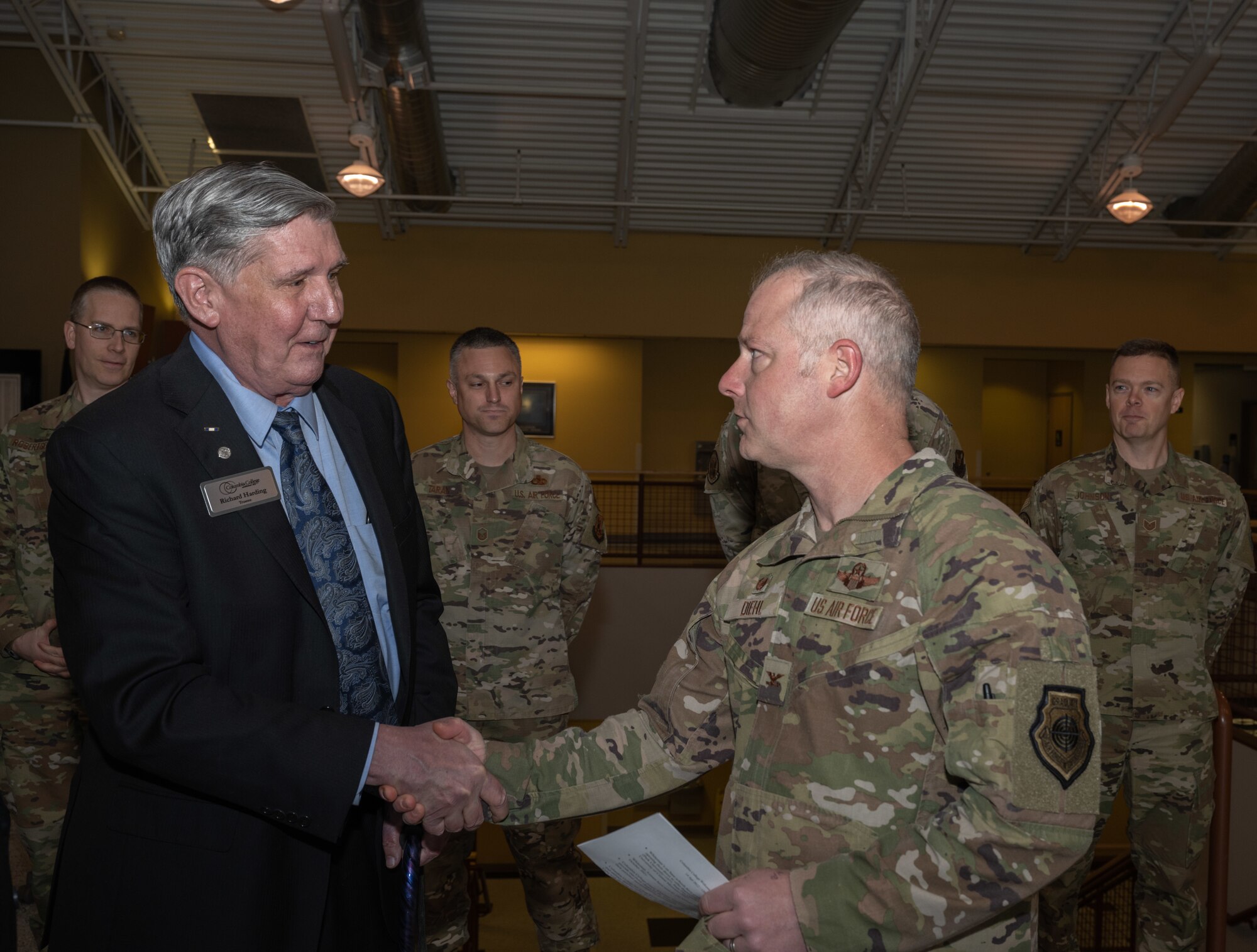 U.S. Air Force Col. Daniel Diehl, Commander of the 509 Bomb Wing, signs a memorandum of understanding between Columbia College and the 509th Bomb Wing on Whiteman Air Force Base on April 14,2022. The memorandum acknowledges Columbia College's partnership by opening it's programs to the Air Force Voluntary Education Program (U.S. Air Force Photo by Airman 1st Class Bryson Britt)