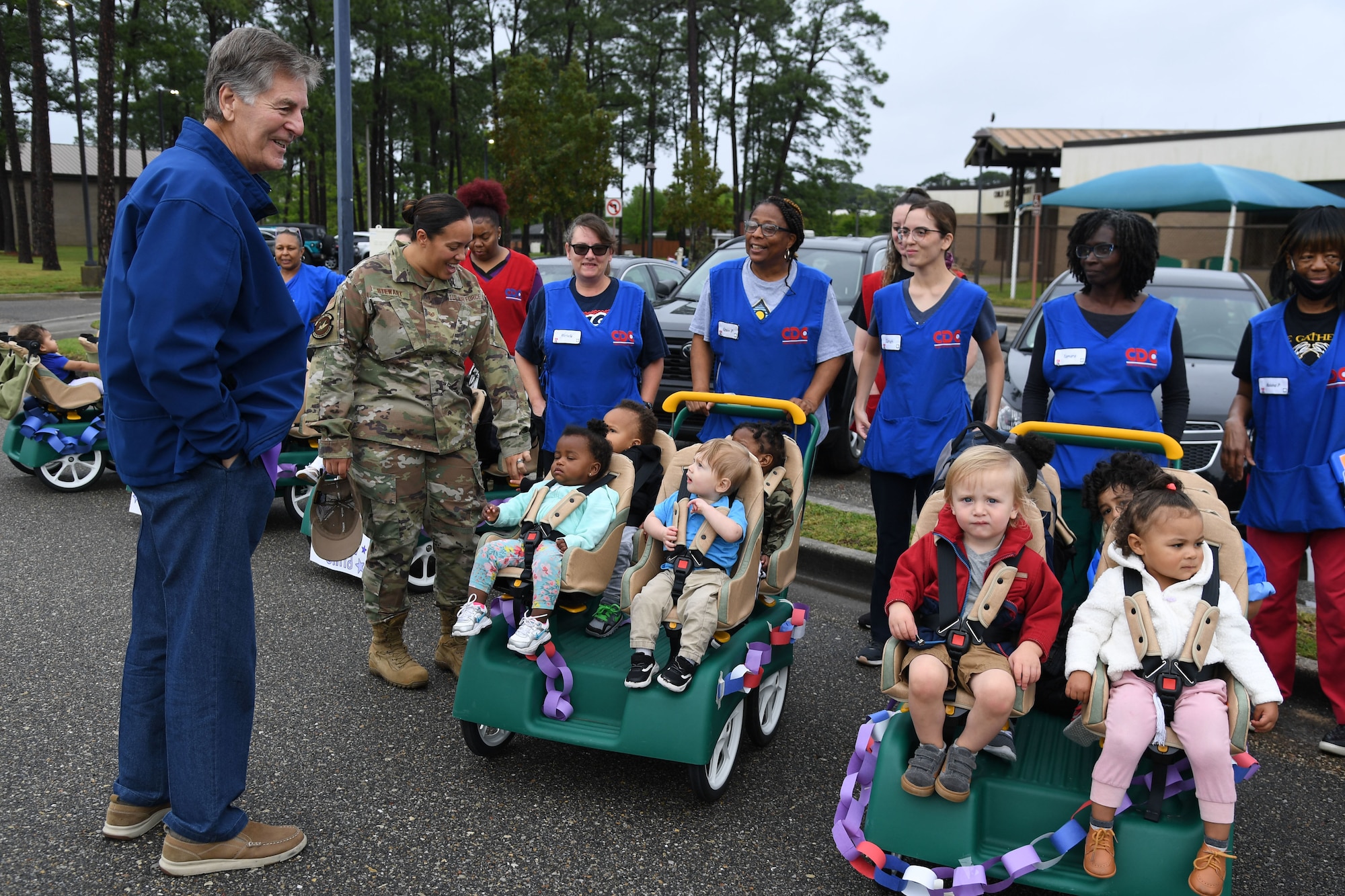Mayor Andrew "FoFo" Gilich, Biloxi, Mississippi mayor, speaks to children from the Keesler Child Development Center during a parade at Keesler Air Force Base, Mississippi, April 14, 2022. The parade was held in recognition for the Month of the Military Child, which is celebrated throughout the month of April. (U.S. Air Force photo by Kemberly Groue)
