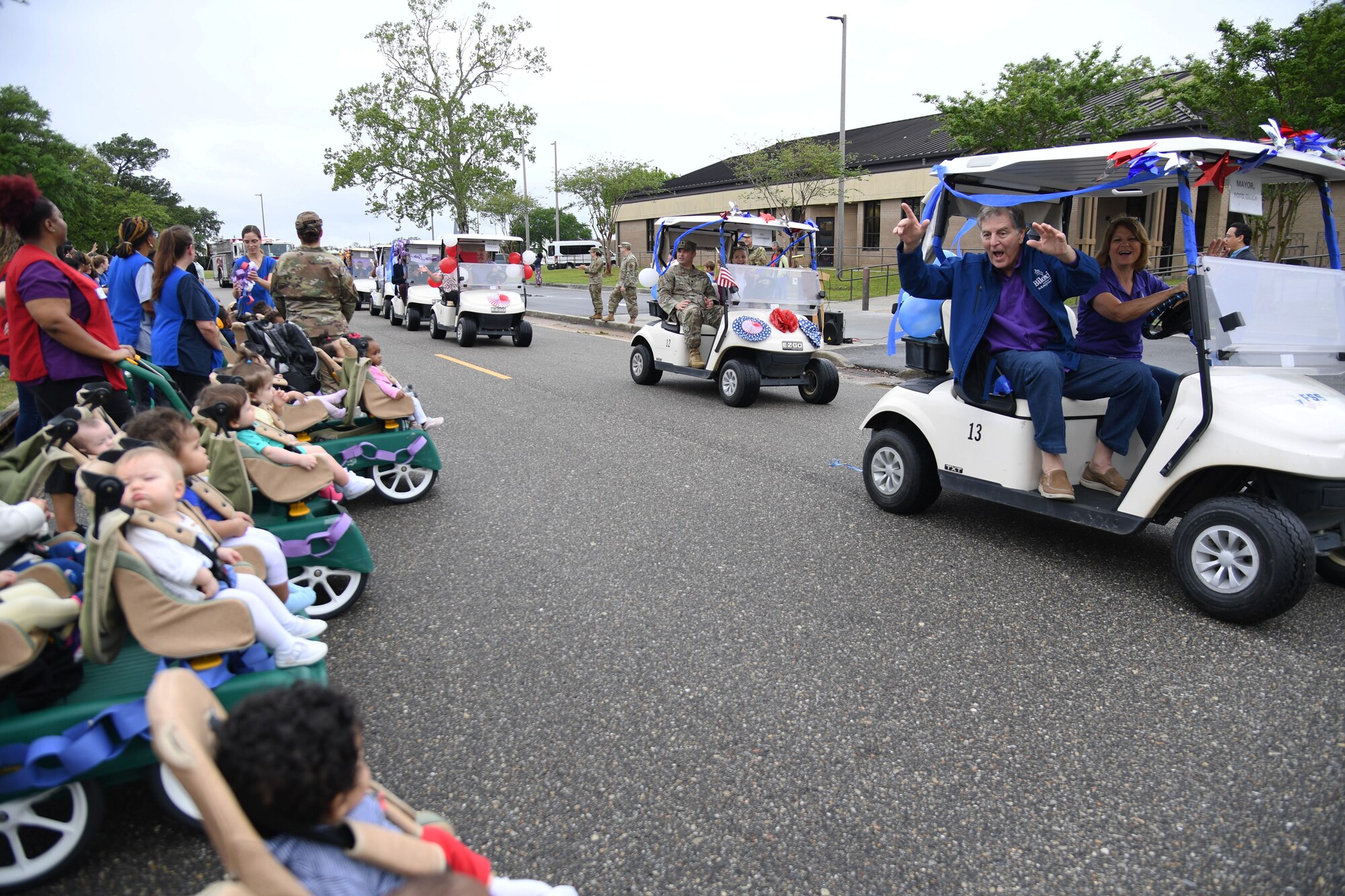 Mayor Andrew "FoFo" Gilich, Biloxi, Mississippi mayor, participates in the Keesler Child Development Center during a parade at Keesler Air Force Base, Mississippi, April 14, 2022. The parade was held in recognition for the Month of the Military Child, which is celebrated throughout the month of April. (U.S. Air Force photo by Kemberly Groue)