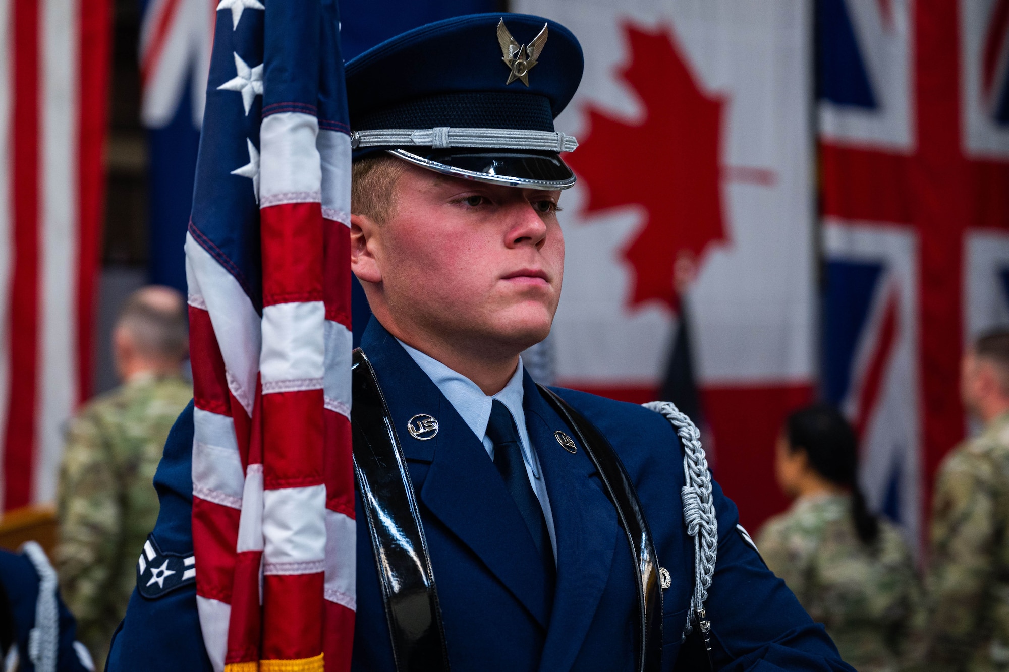 U.S. Air Force Airman 1st Class Avery Balaskovitz, member of the Vandenberg Space Force Base Honor Guard team and assigned to the 30th Security Forces Squadron, holds the American flag during the 18th Space Defense Squadron’s re-designation ceremony at Vandenberg SFB, Calif., April 13, 2022. The 18 SDS, previously 18th Space Control Squadron, provides standardized, accurate position and velocity information to satellite owners, operators, launch entities, and others, enabling responsible use of space and assisting spacefarers in avoiding collisions. (U.S. Space Force photo by Tech. Sgt. Luke Kitterman)