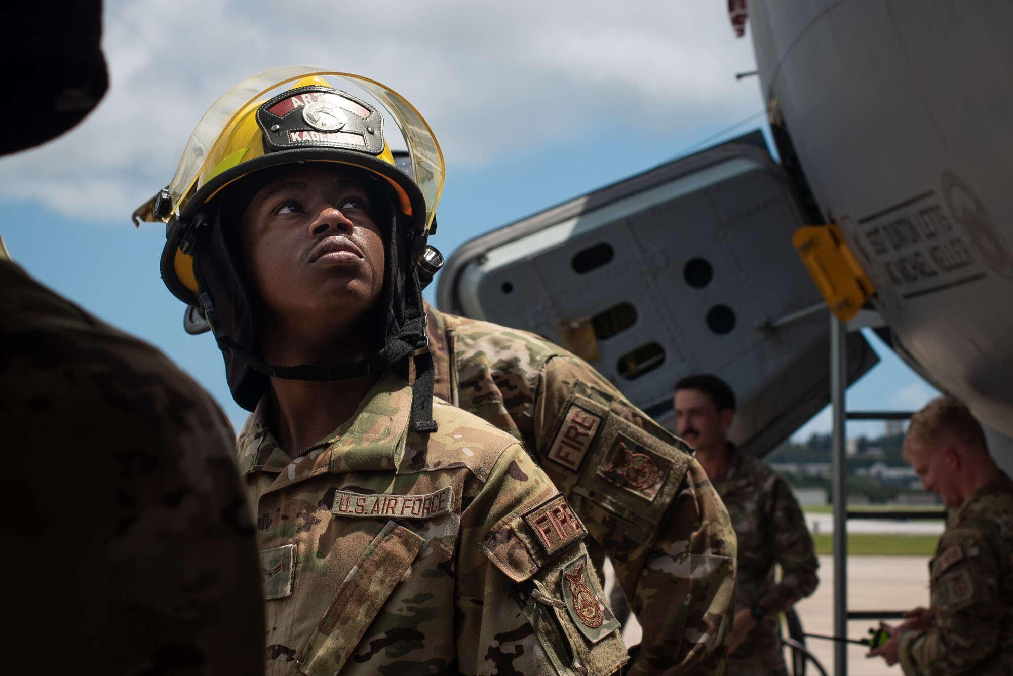 Airman observes another Airman.