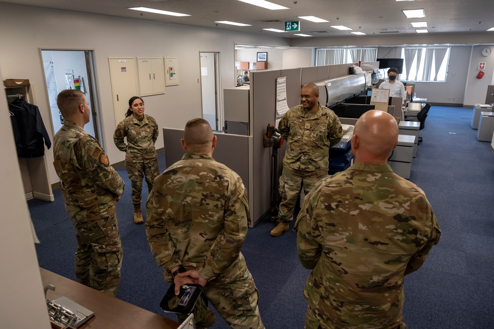Airman briefing daily duties to leadership.