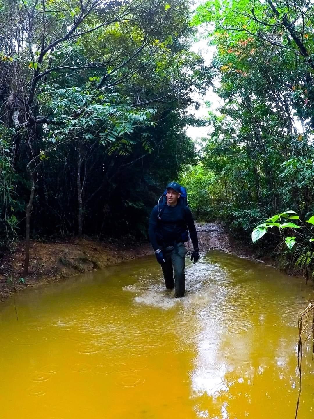U.S. Marine Corps Gunnery Sgt. Bruce Jones, an inspections chief with Marine Corps Installations Pacific, hikes after his rehabilitation on Okinawa, Japan. Jones shares his story on the establishment of his trekking group, the challenges and tragedies he faced, and the perseverance and dedication it took for him to continue his adventurous lifestyle with his group and son. (Courtesy photo by Gunnery Sgt. Bruce Jones)