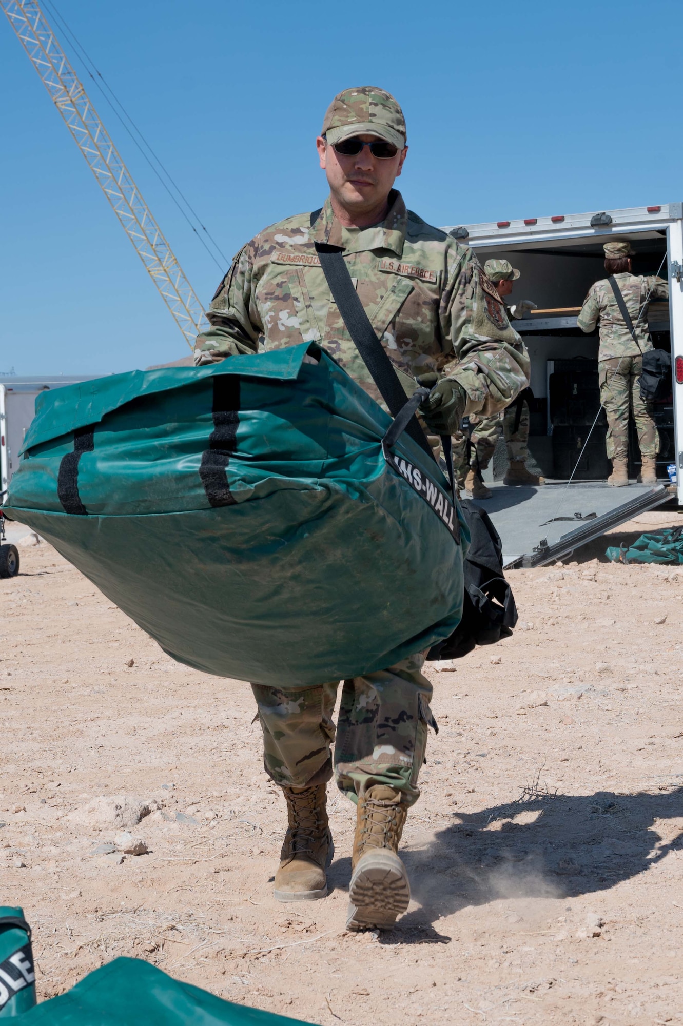 Tech. Sgt. Daniel Dumbrique, 162nd FSS Specialist, unloads equipment during an in-person combined training event with other Air and Army National Guard units this week in Las Vegas.