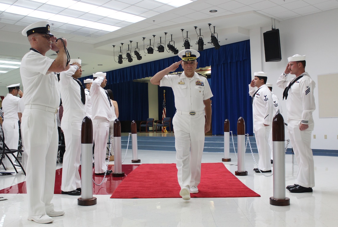 Capt. Michael Luckett relieved Capt. Jeffrey Grimes as Commanding Officer of U.S. Naval Base Guam (NBG) during a Change of Command Ceremony held at Cmdr. William C. McCool Elementary/Middle School onboard NBG, July 19.