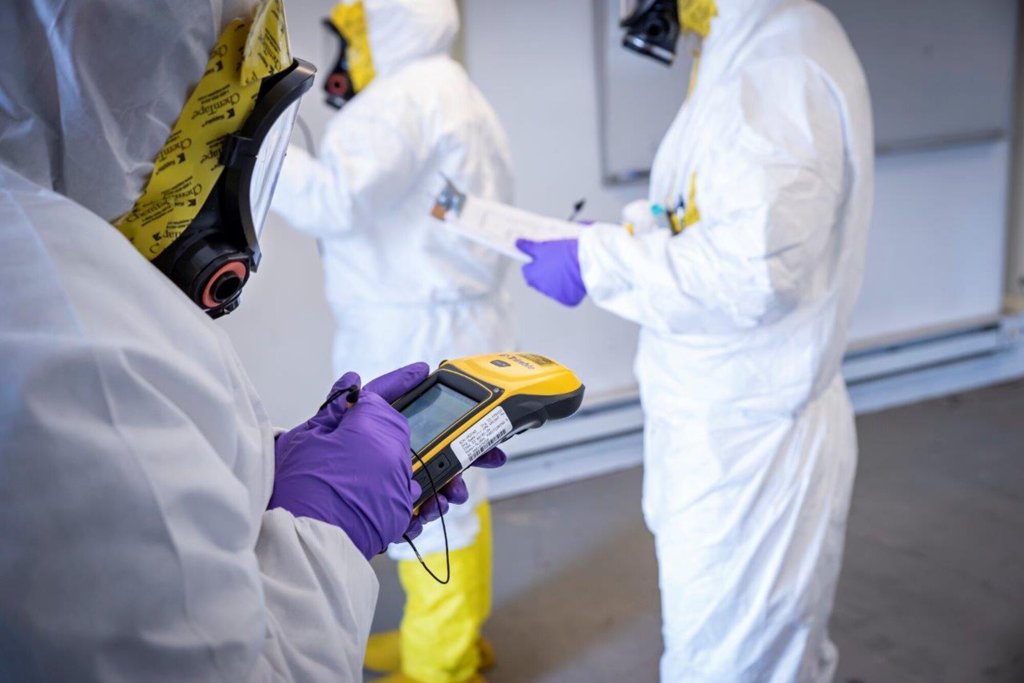 Students attending the Air Force Radiation Assessment Team (AFRAT) basic course at the USAF School of Aerospace Medicine practice procedures to measure radiological contamination during a field exercise in March 2022 at the Warfighter Training Facility at Wright-Patterson Air Force Base. (U.S. Air Force photo / Richard Eldridge)