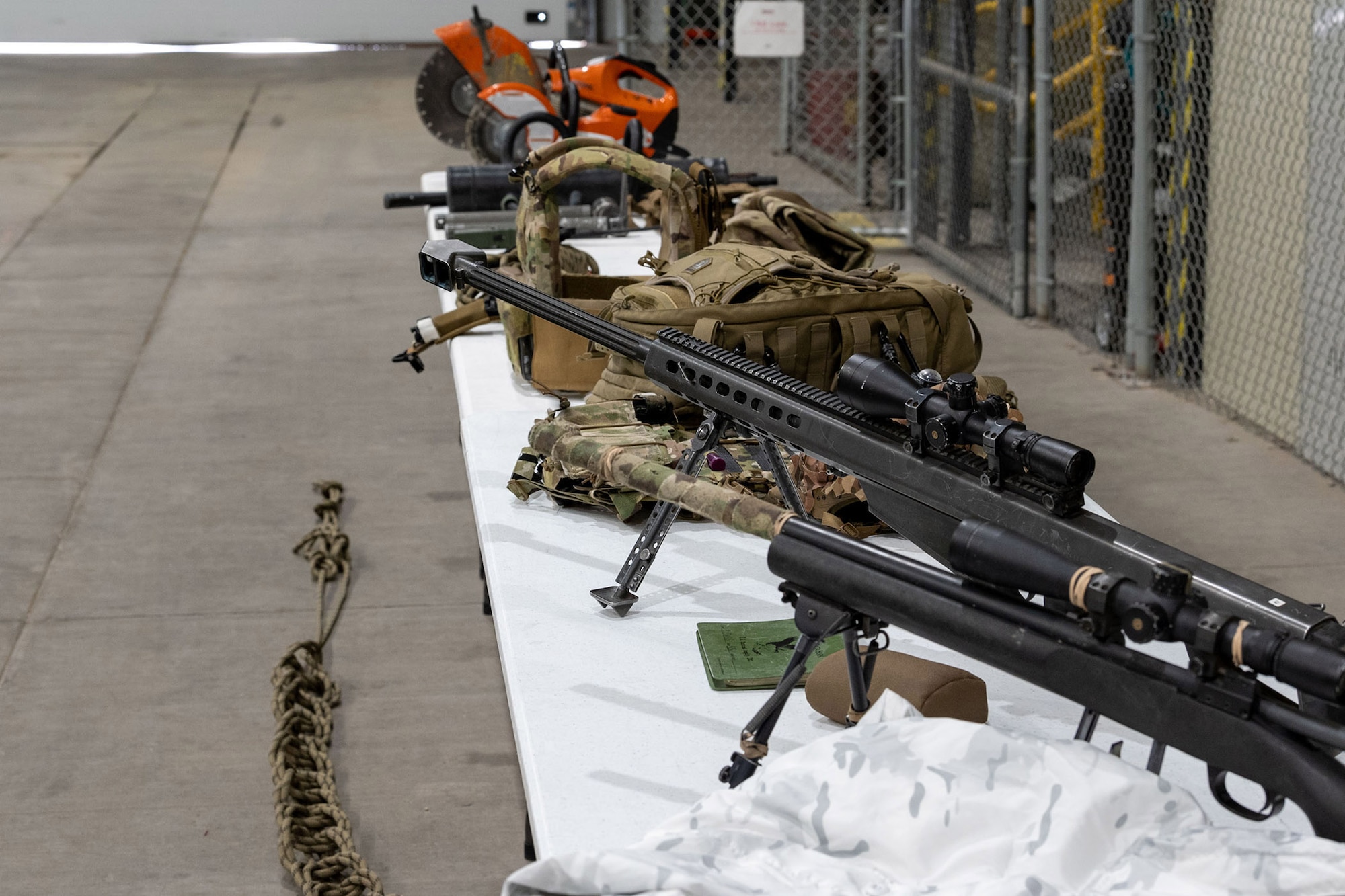 Pictured is equipment featured by the 341st Missile Security Operation Squadron tactical response force at a joint-training event March 8, 2022, at the emergency management warehouse on Malmstrom Air Force Base, Mont. The 341st Civil Engineer Squadron EM unit invited the FBI to better familiarize and integrate themselves with weapons and tactics used by base personnel during emergency response events, ultimately increasing safety. (U.S. Air Force photo by Airman Elijah Van Zandt)