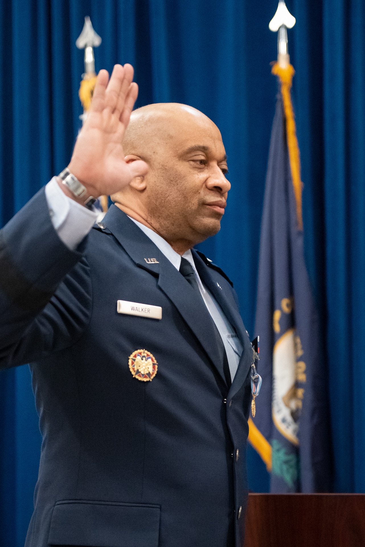 Maj. Gen. Charles M. Walker, director of the Office of Complex Investigations at the National Guard Bureau, takes the oath of office during his promotion ceremony, held in the Capitol Rotunda in Frankfort, Ky., March 12, 2022. Walker previously served as chief of staff for the Kentucky Air National Guard. (U.S. Air National Guard photo by Dale Greer)
