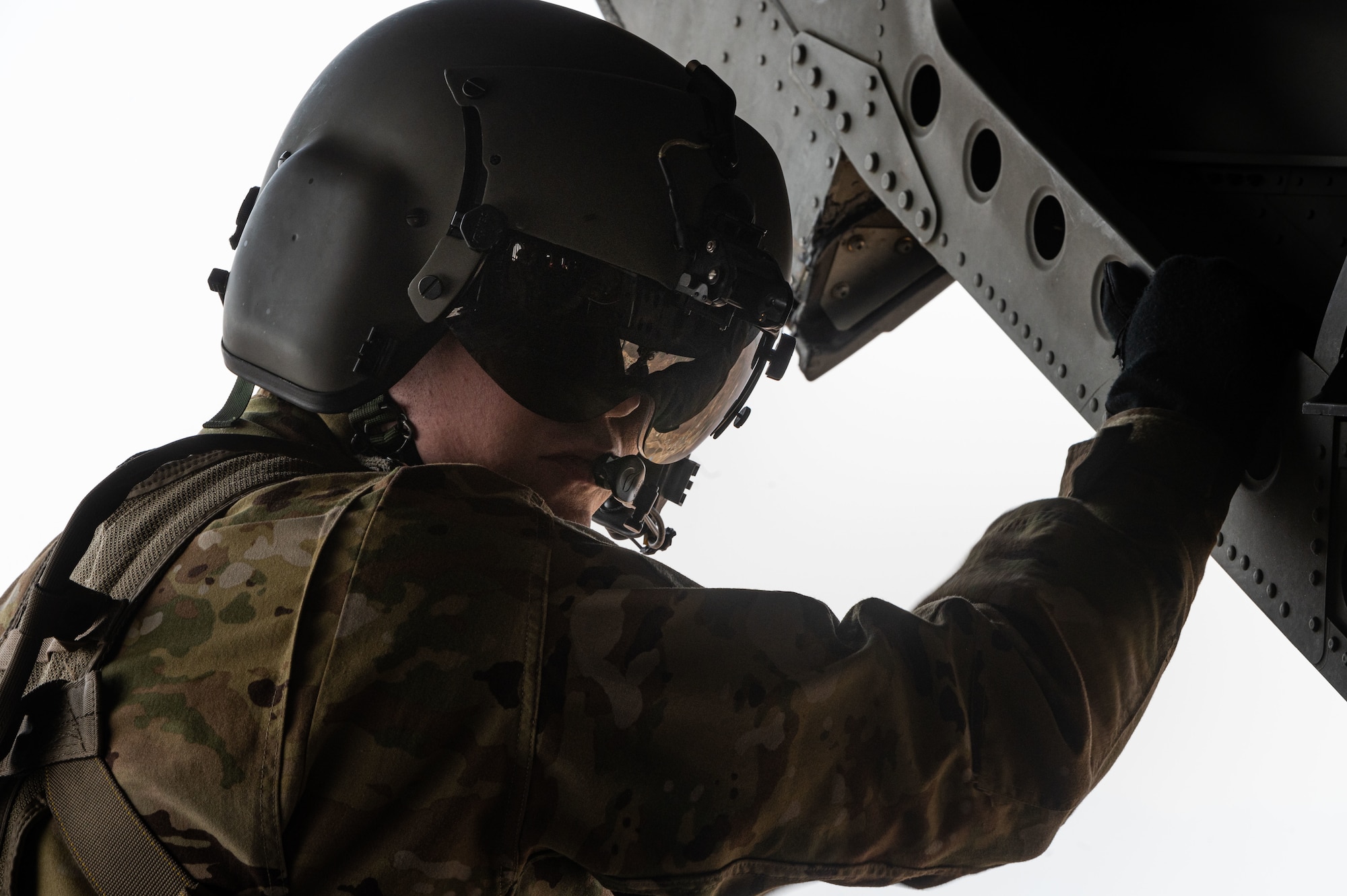 U.S. Army Pfc. Jacob Gutwein, 3-2 General Support Aviation Battalion air crew member, rides in a CH-47F Chinook to Pilsung Range, Republic of Korea, March 30, 2022. The Army worked along with the 607th Air Support Operations Group and the 36th Fighter Squadron, to demonstrate the full capabilities of lethal targeting for Lt. Gen. Scott Pleus, Seventh Air Force commander, who was conducting a battlefield circulation. (U.S. Air Force photo by Senior Airman Megan Estrada)
