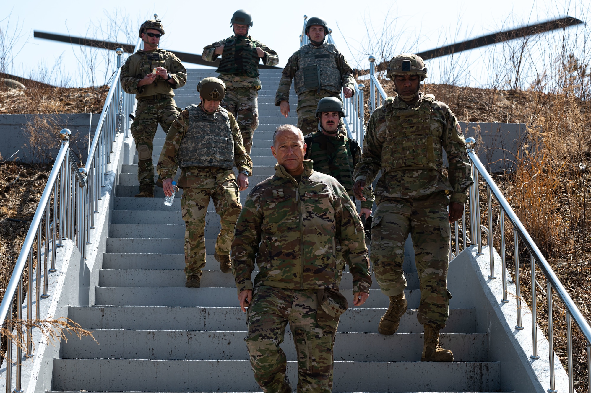 Lt. Gen. Scott L. Pleus, center, Seventh Air Force commander, arrives for a battlefield circulation at Pilsung Range, Republic of Korea, March 30, 2022. Battlefield circulations are meant to give leaders better situational awareness of the capabilities of their respective area of operations. (U.S. Air Force photo by Senior Airman Megan Estrada)