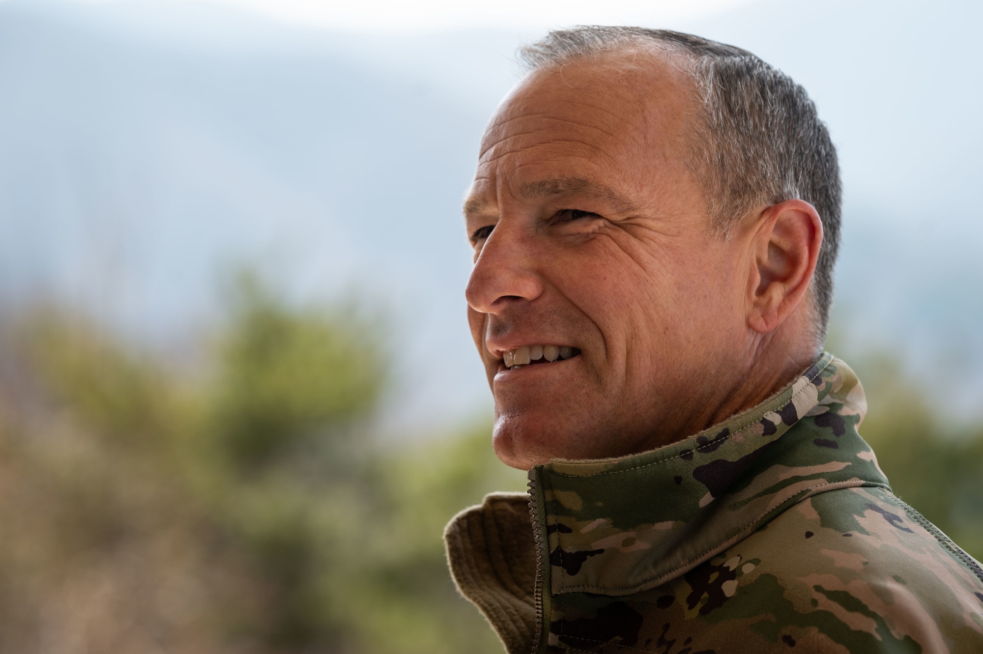 Lt. Gen. Scott L. Pleus, Seventh Air Force commander, listens to 607th Air Support Operations Group Tactical Air Control Party Airmen describing their gear at Pilsung Range, Republic of Korea, March 30, 2022. Pleus conducted a battlefield circulation accompanied by 607th ASOG TACP Airmen, the 36th Fighter Squadron and U.S. Army Army 3-2 General Support Aviation Battalion Soldiers who worked hand in hand to demonstrate the full capabilities of lethal targeting. (U.S. Air Force photo by Senior Airman Megan Estrada)
