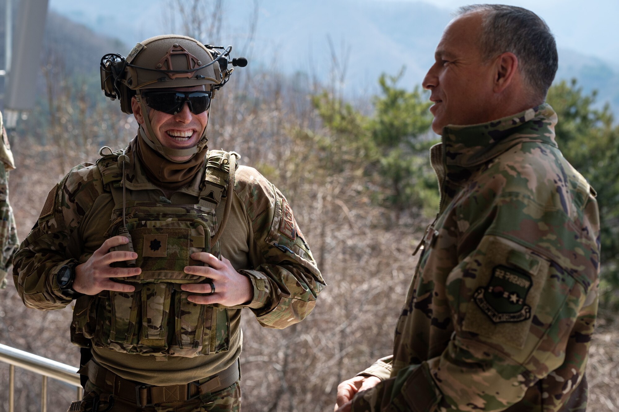 Lt Col Raymond Kilroy, 604th Air Support Operations Squadron commander, speaks to Lt. Gen. Scott L. Pleus, Seventh Air Force commander, during a battlefield circulation at the Pilsung Range, Republic of Korea, March 30, 2022. Pleus conducted a battlefield circulation with the help of 607th Air Support Operations Group Tactical Air Control Party Airmen, the 36th Fighter Squadron and U.S. Army 3-2 General Support Aviation Battalion soldiers who worked hand in hand to demonstrate the full capabilities of lethal targeting. (U.S. Air Force photo by Senior Airman Megan Estrada)