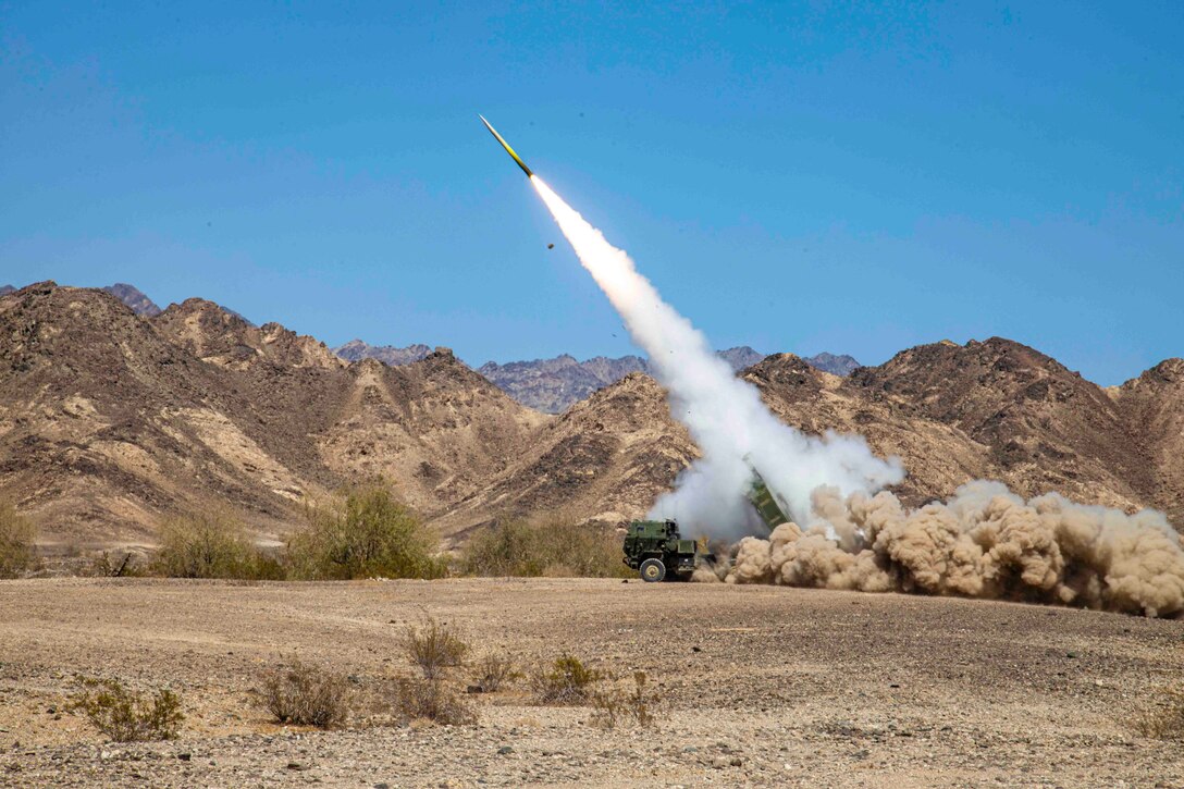 A rocket launches from a military vehicle.