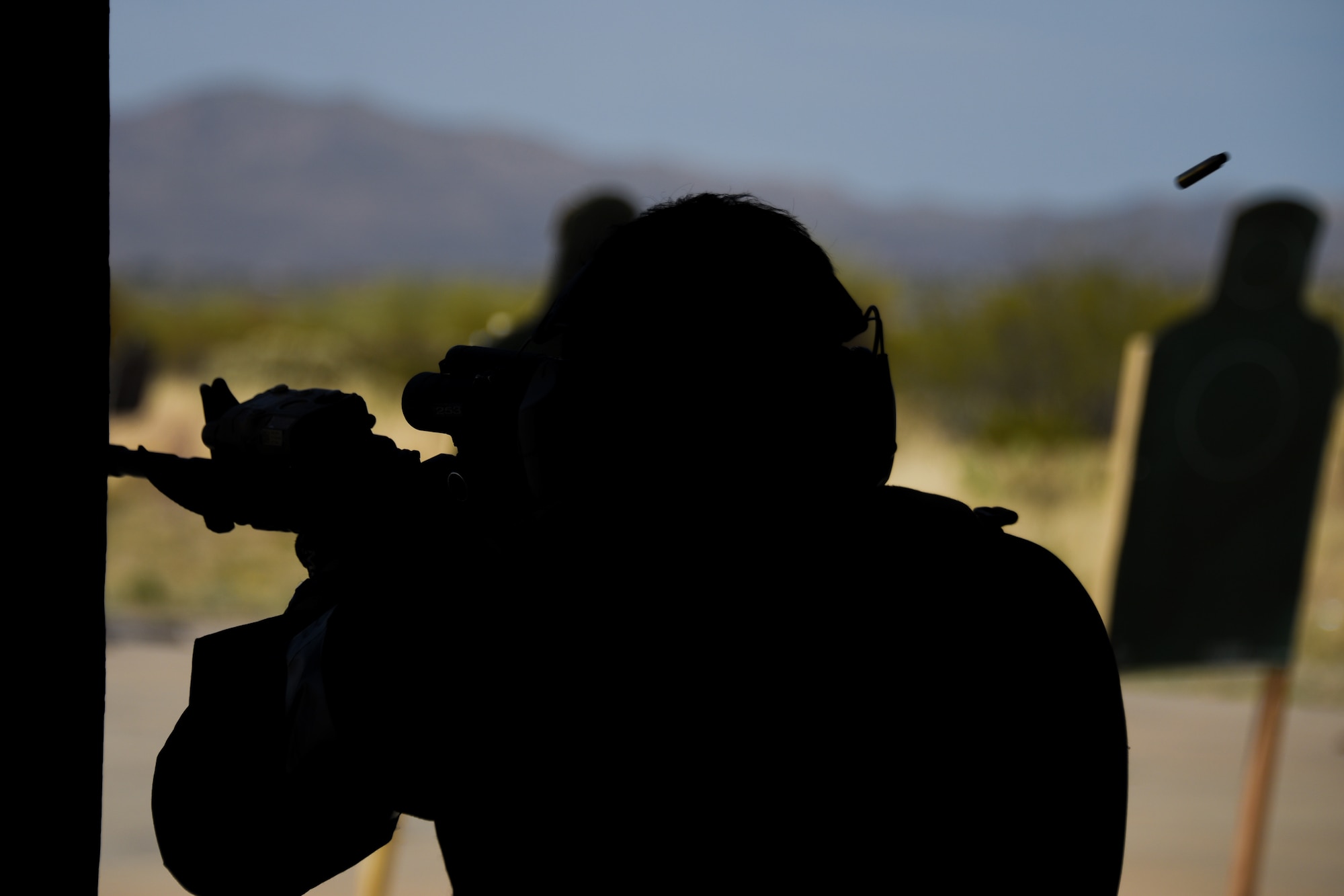 A photo of an Airman shooting.