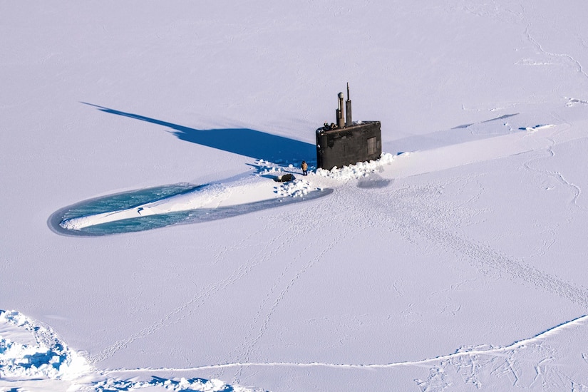 A submarine breaks through ice.