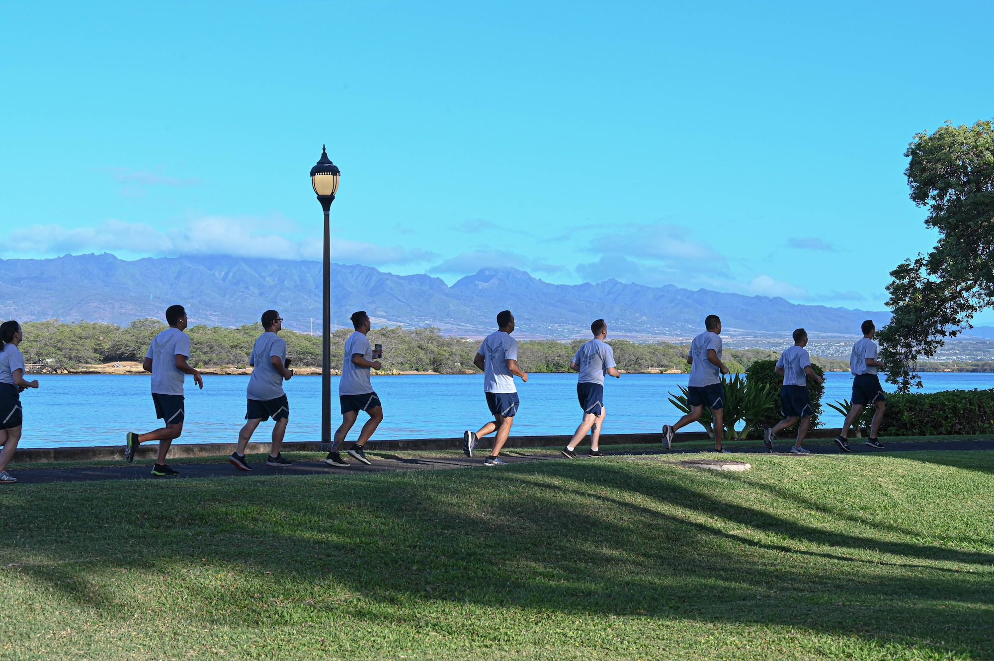 Students attending the Noncommissioned Officer Academy at the Binnicker Professional Military Education Center begin a school run at Joint Base Pearl Harbor-Hickam, Hawaii, April 14, 2022. The NCOA is the second level of Enlisted Professional Military Education and prepares Technical Sergeants to manage and lead units. (U.S. Air Force photo by 1st Lt. Benjamin Aronson)