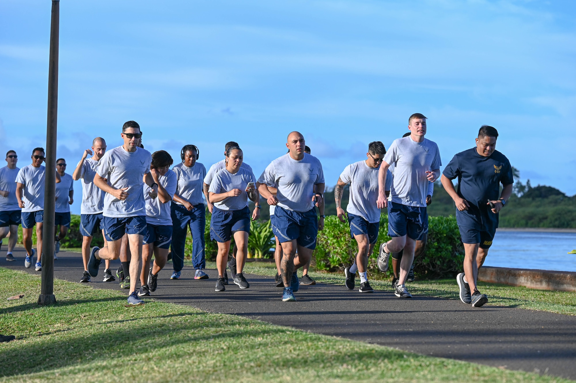 Students attending the Noncommissioned Officer Academy at the Binnicker Professional Military Education Center begin a school run at Joint Base Pearl Harbor-Hickam, Hawaii, April 14, 2022. The NCOA is the second level of Enlisted Professional Military Education and prepares Technical Sergeants to manage and lead units. (U.S. Air Force photo by 1st Lt. Benjamin Aronson)