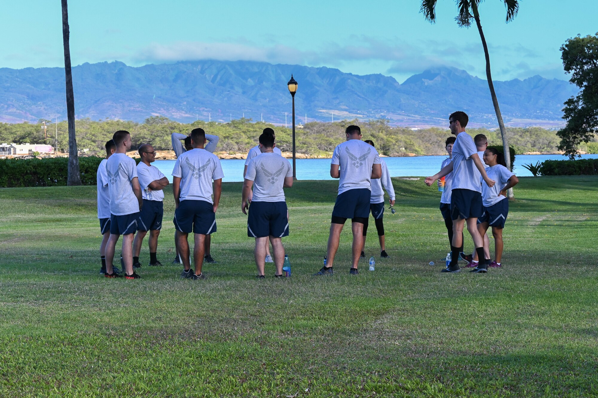 Students attending the Noncommissioned Officer Academy at the Binnicker Professional Military Education Center stretch before a school run at Joint Base Pearl Harbor-Hickam, Hawaii, April 14, 2022. The NCOA is the second level of Enlisted Professional Military Education and prepares Technical Sergeants to manage and lead units. (U.S. Air Force photo by 1st Lt. Benjamin Aronson)