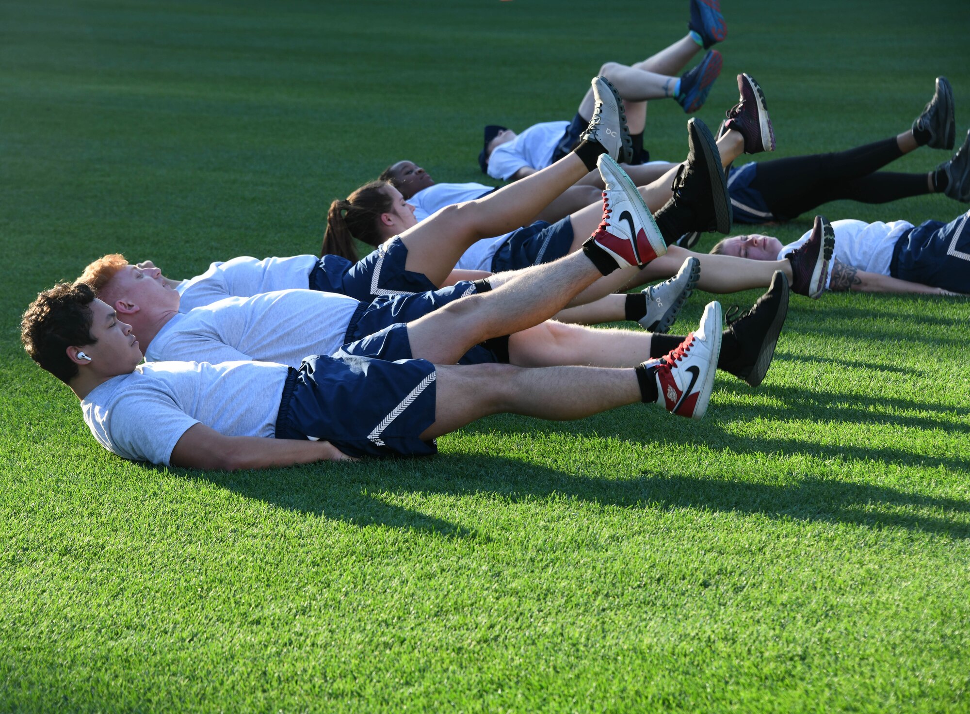 Airmen perform flutter kicks at Nationals Park in Washington, D.C., April 14, 2022.
