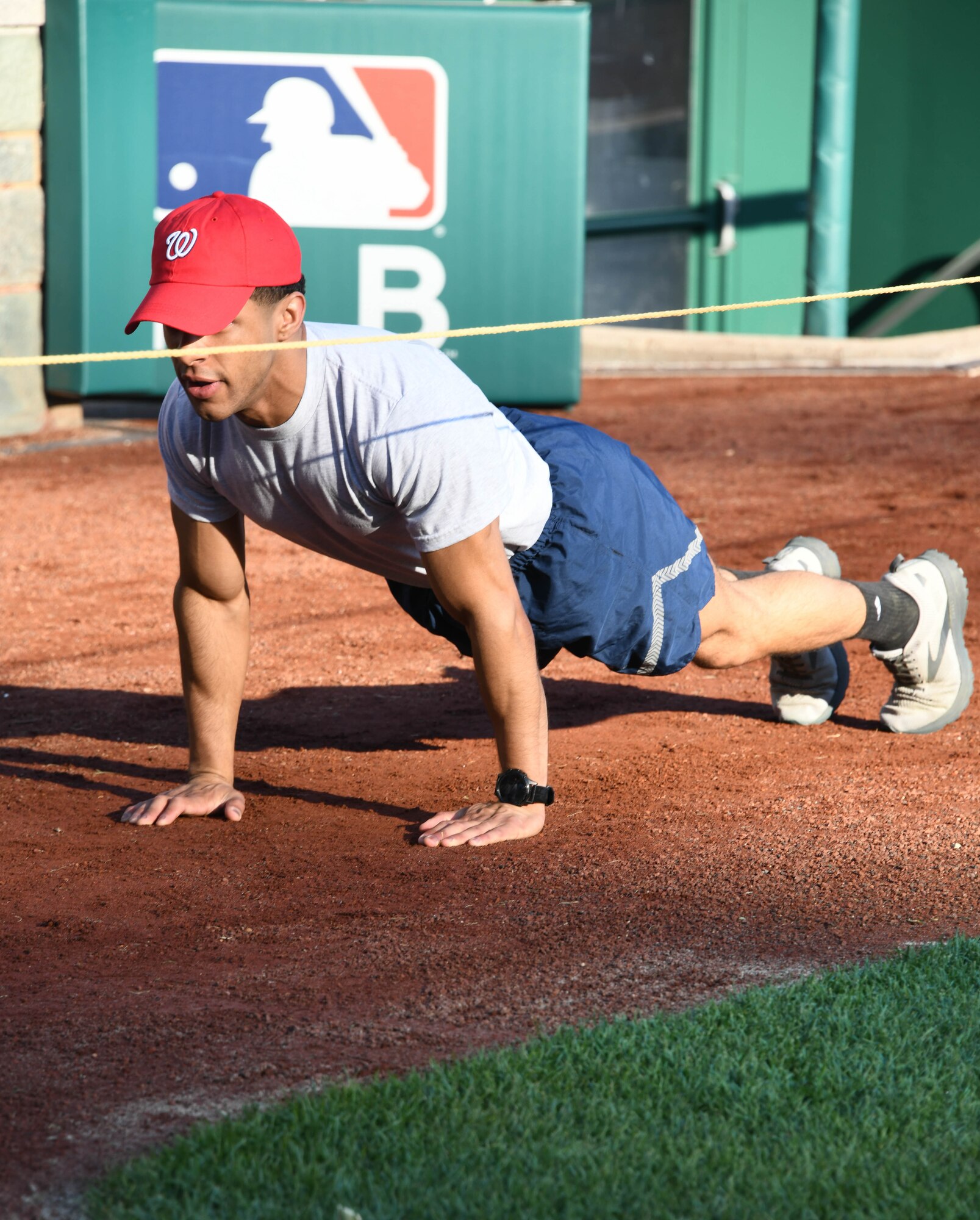 An Airman performs push-ups during a high intensity interval training workout event at National Parks in Washington, D.C., April 14, 2022.