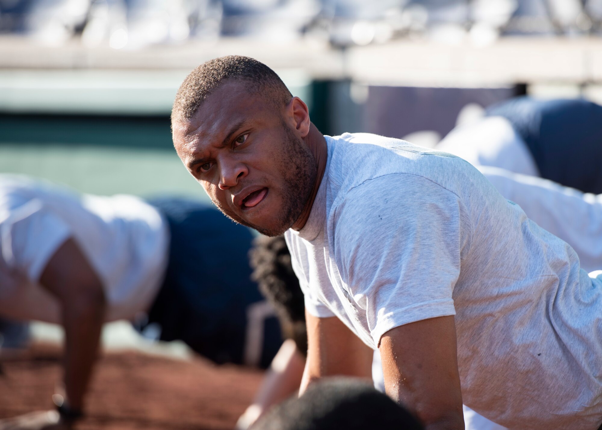 An Airman performs push-ups during a workout at Nationals Park, Washington D.C., April 14, 2022.