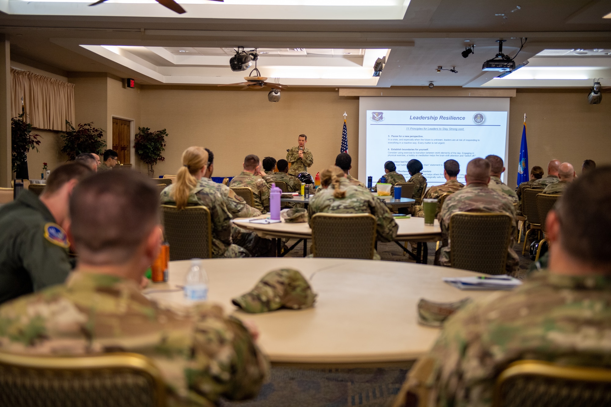 group of people sitting in a room
