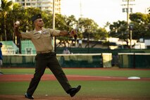 U.S. Marine Corps Col. Speros Koumparakis, commanding officer, Marine Corps Base Hawaii, throws the first pitch at the University of Hawai’i at Manoa versus University of California Riverside baseball game, Les Murakami Stadium, Honolulu, Hawaii, April 9, 2022. Koumparakis was invited to throw the first pitch during the pre-game festivities, which served as an opportunity to engage with the community and maintain the longstanding relationship between the University of Hawaii and MCBH. (U.S. Marine Corps photo by Lance Cpl. Chandler Stacy)