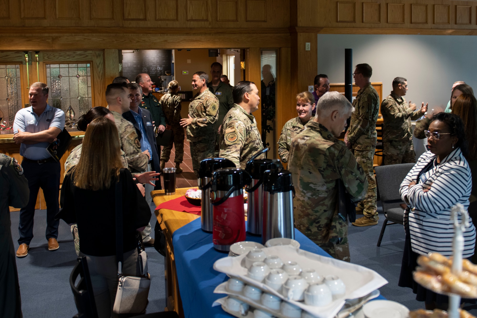 The newest class of Tyndall Air Force Base’s honorary commanders mingle with various commanders at Tyndall Air Force base, Florida, April 13, 2022