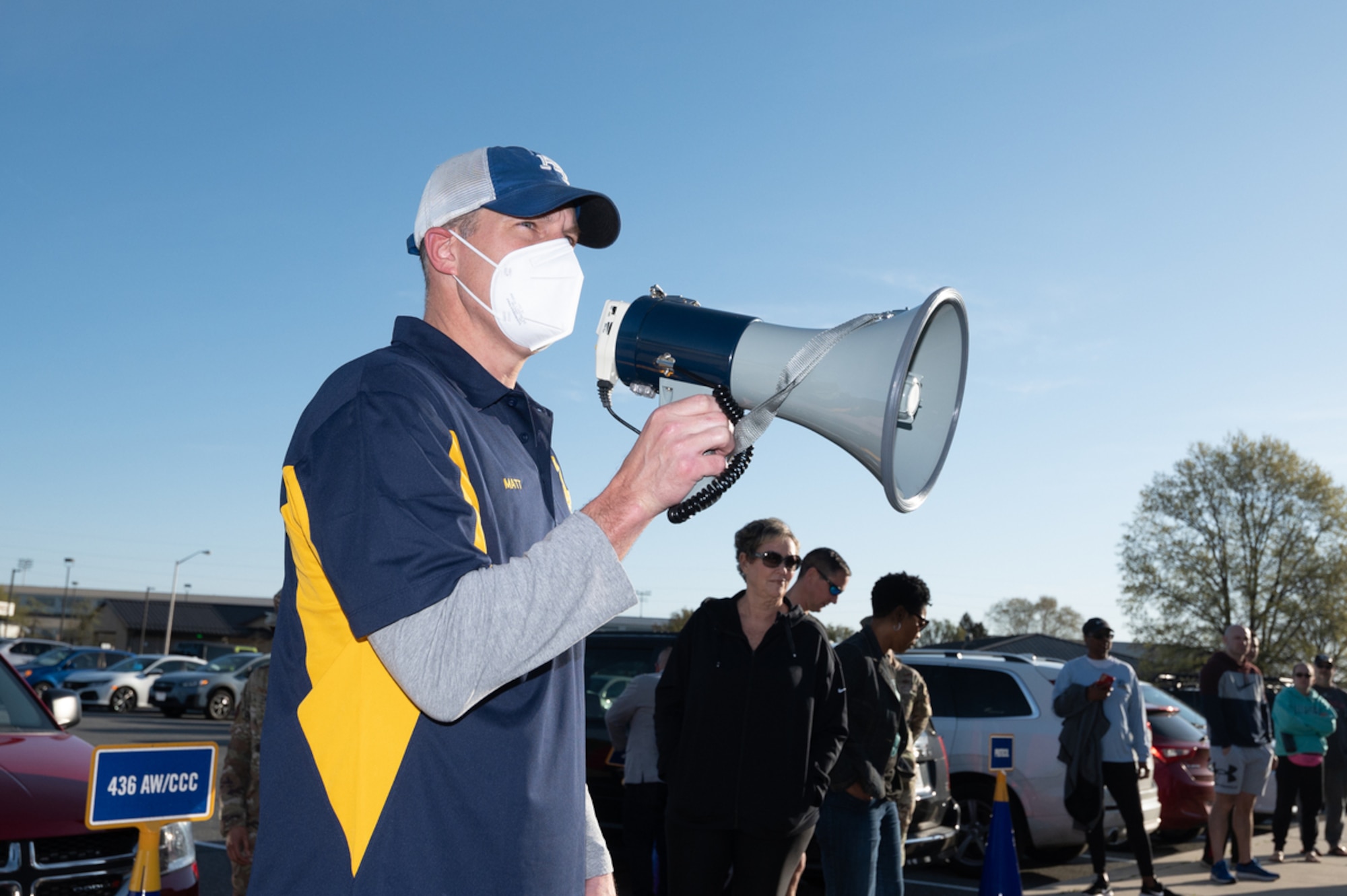 Col. Matt Husemann, 436th Airlift Wing commander, offers remarks to participants of the 2022 Sexual Assault Awareness Prevention Month Flip Flop 5K Walk on Dover Air Force Base, Delaware, April 15, 2022. More than 300 Airmen, civilian employees and family members participated in the event. (U.S. Air Force photo by Mauricio Campino)