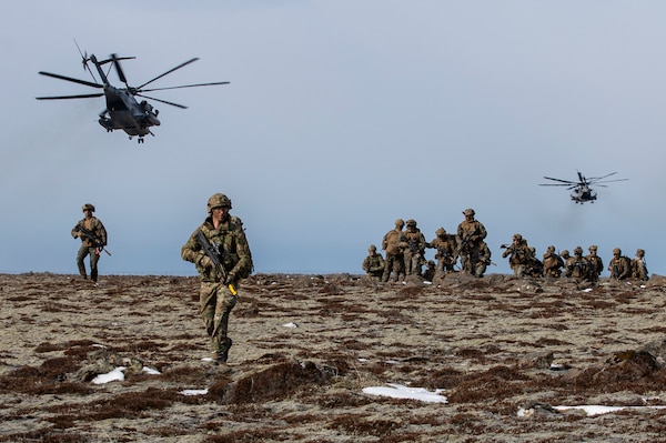 U.S. Marines assigned to the 22nd Marine Expeditionary Unit and Royal Marine Commandos assigned to M Company, 42 Commando Royal Marines execute a tactical recovery of aircraft and personnel exercise during Northern Viking 2022 on Keflavik Airbase, Iceland, April 8, 2022.