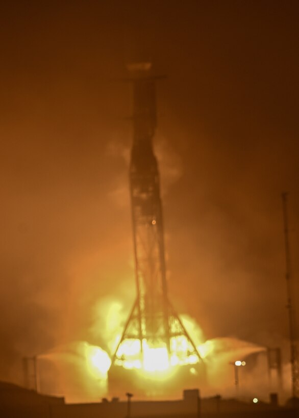 A SpaceX Falcon 9 rocket carrying National Reconnaissance Office Mission (NROL-85) launches from Space Launch Complex-4 East April 17, 2022, at 6:13 a.m. PST, at Vandenberg Space Force Base, Calif. NROL-85 is the first NRO mission to reuse a SpaceX rocket booster, and is the second Falcon 9 launch procured through the Nation Security Launch (NSSL) contract to launch from the Western Range. (U.S. Space Force photo by Airman 1st Class Tiarra Sibley)