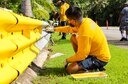 Guam-based Sailors painted the railings for their sister village Hagat, as part of a community service project.