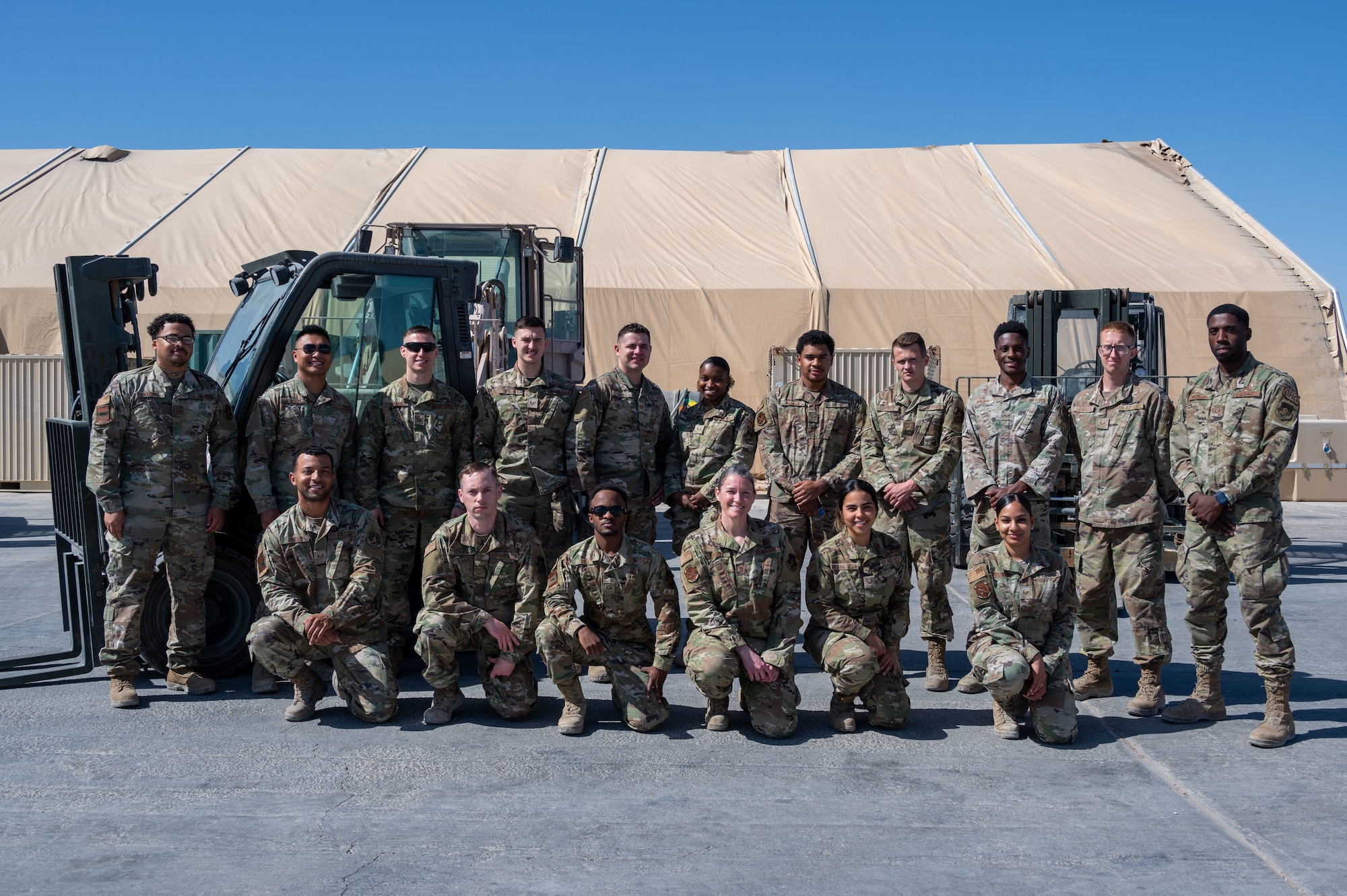 The 332d Expeditionary Logistics Readiness Squadron Traffic Management Operations Airmen pose for a photo at an undisclosed location in Southwest Asia, April 9, 2022. The 332d ELRS provides premier combat sustainment operations to AFCENT's primary combat wing in order to deter and defeat regional aggressors.