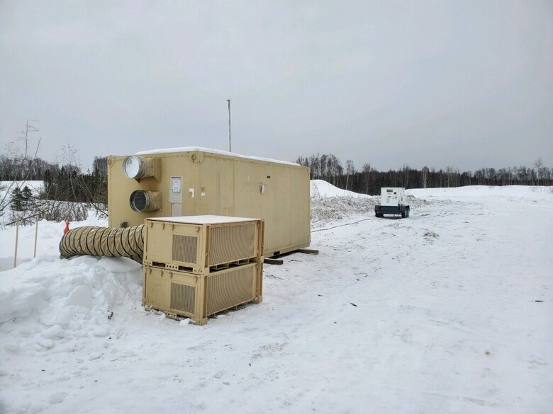 The TripLine equipment set-up that includes a shelter, two environmental control units and a generator were transported and place near the previously buried sensing cable site located along the loop road that goes around fish and triangle lakes on the northern end of the Elmendorf side of the base. The U.S. Army Engineer Research and Development Center’s Cold Regions Research and Engineering Laboratory successfully demonstrated groundbreaking technology to detect airborne targets during a multi-service exercise.