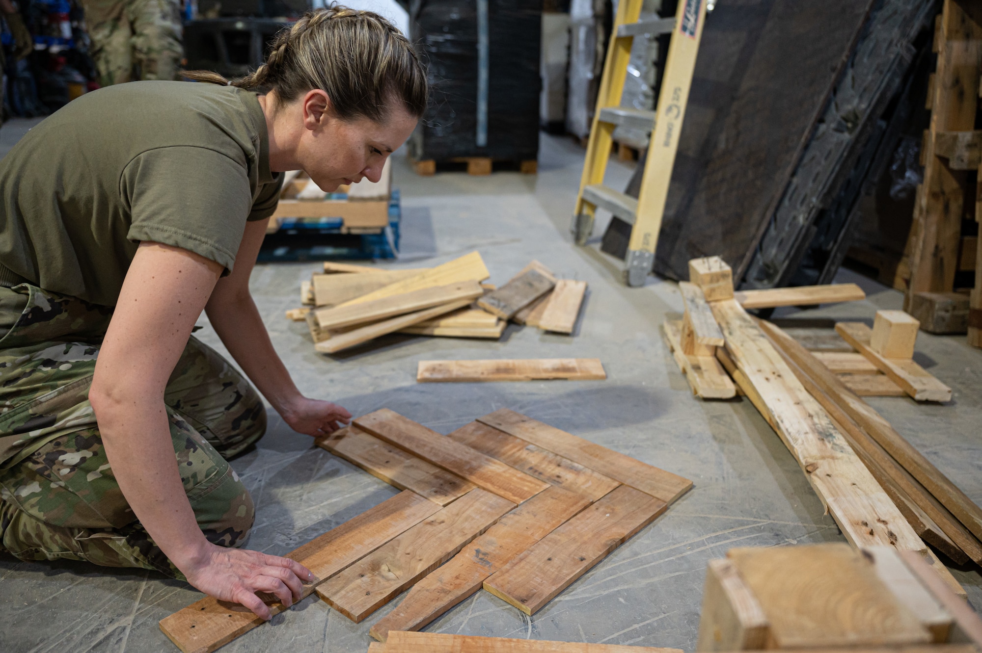 Project Salvage Pallets is a new upcycle program at Ali Al Salem Air Base that allows service members to use salvaged wooden pallets to create furniture for airmen dorms and common areas.