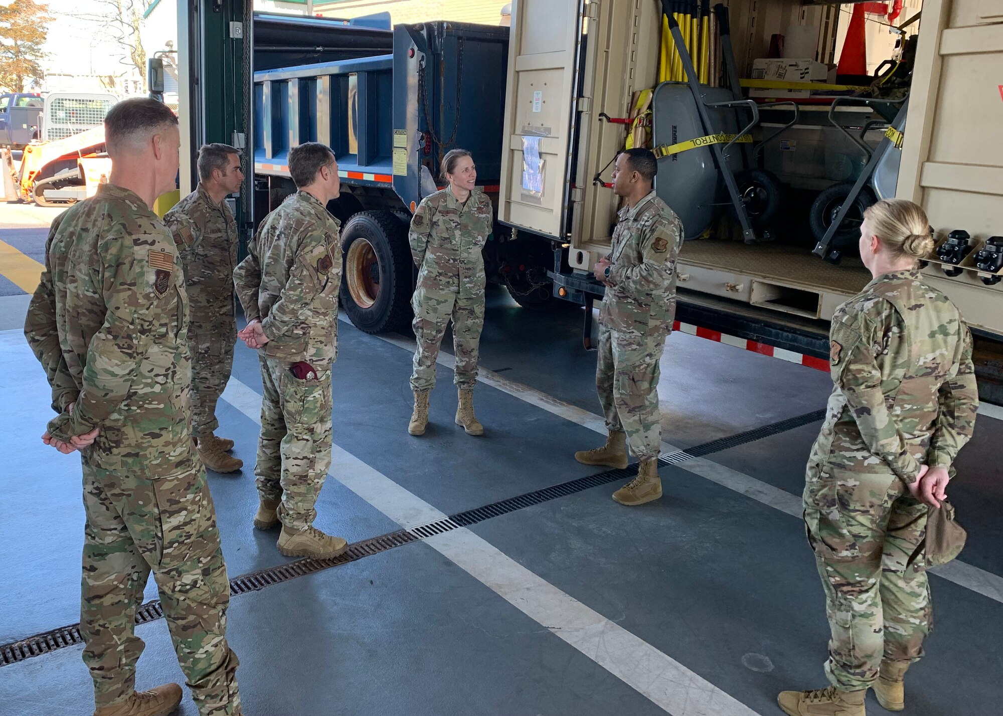 Staff Sgt. Matthew Akiwowo, 106th Civil Engineer Operations Management Journeymen and Senior Master Sgt. Lindy Ross, 106th Civil Engineer Operations Management Superintendent, briefs Brig. Gen. Denise Donnell, the commander of the New York Air National Guard, about the debris clearance capability of 106th Civil Engineer squadron at Francis S. Gabreski ANGB, Westhampton Beach, N.Y., April 8, 2022. Donnell and the New York State Command Chief Master Sgt. Denny L. Richardson met with wing leadership and toured the base facilities including the communication and security forces building, fire department, medical, operations and maintenance groups. (U.S. Air National Guard photo by Lt. Cheran A. Campbell)