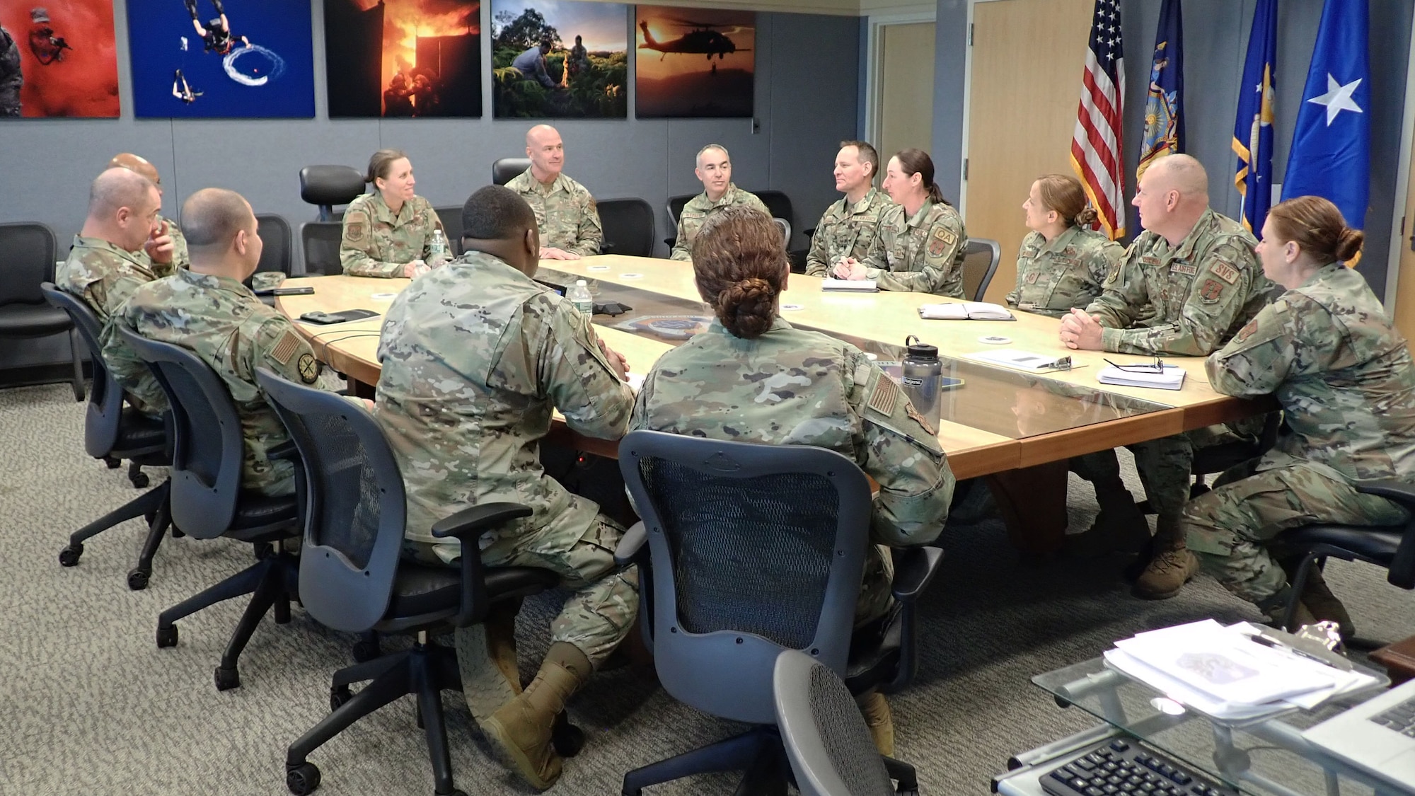 Brig. Gen. Denise Donnell, the commander of the New York Air National Guard, and Chief Master Sgt. Denny L. Richardson, New York State Command Chief, speak with the 106th Rescue Wing Senior Enlisted Leaders at Francis S. Gabreski ANGB, Westhampton Beach, N.Y., April 8, 2022. Donnell and the New York State Command Chief Master Sgt. Denny L. Richardson met with wing leadership and toured the base facilities including the communication and security forces building, fire department, medical, operations and maintenance groups. (U.S. Air National Guard photo by Lt. Cheran A. Campbell)