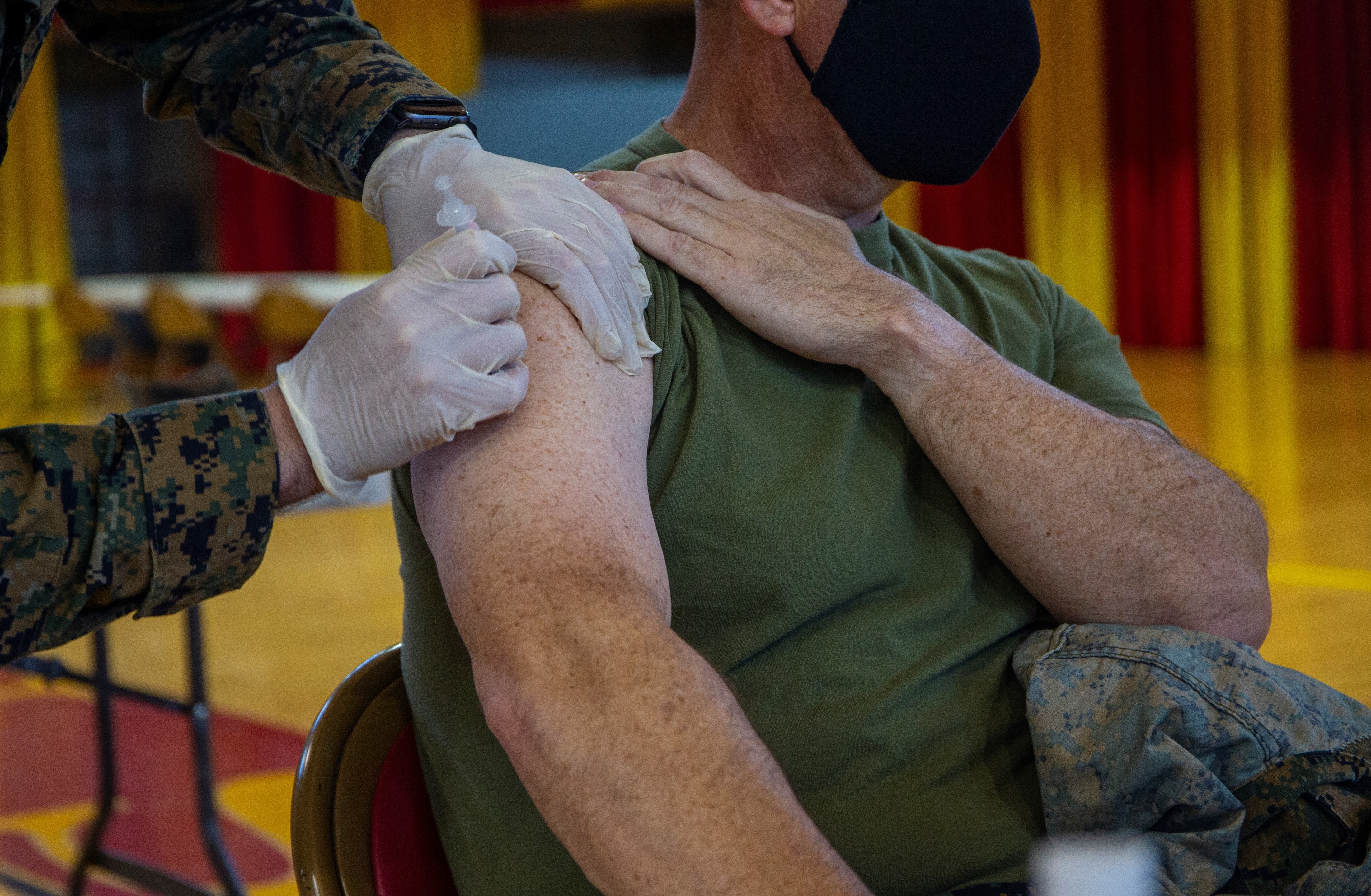 A Marine receiving the Covid-19 vaccine.